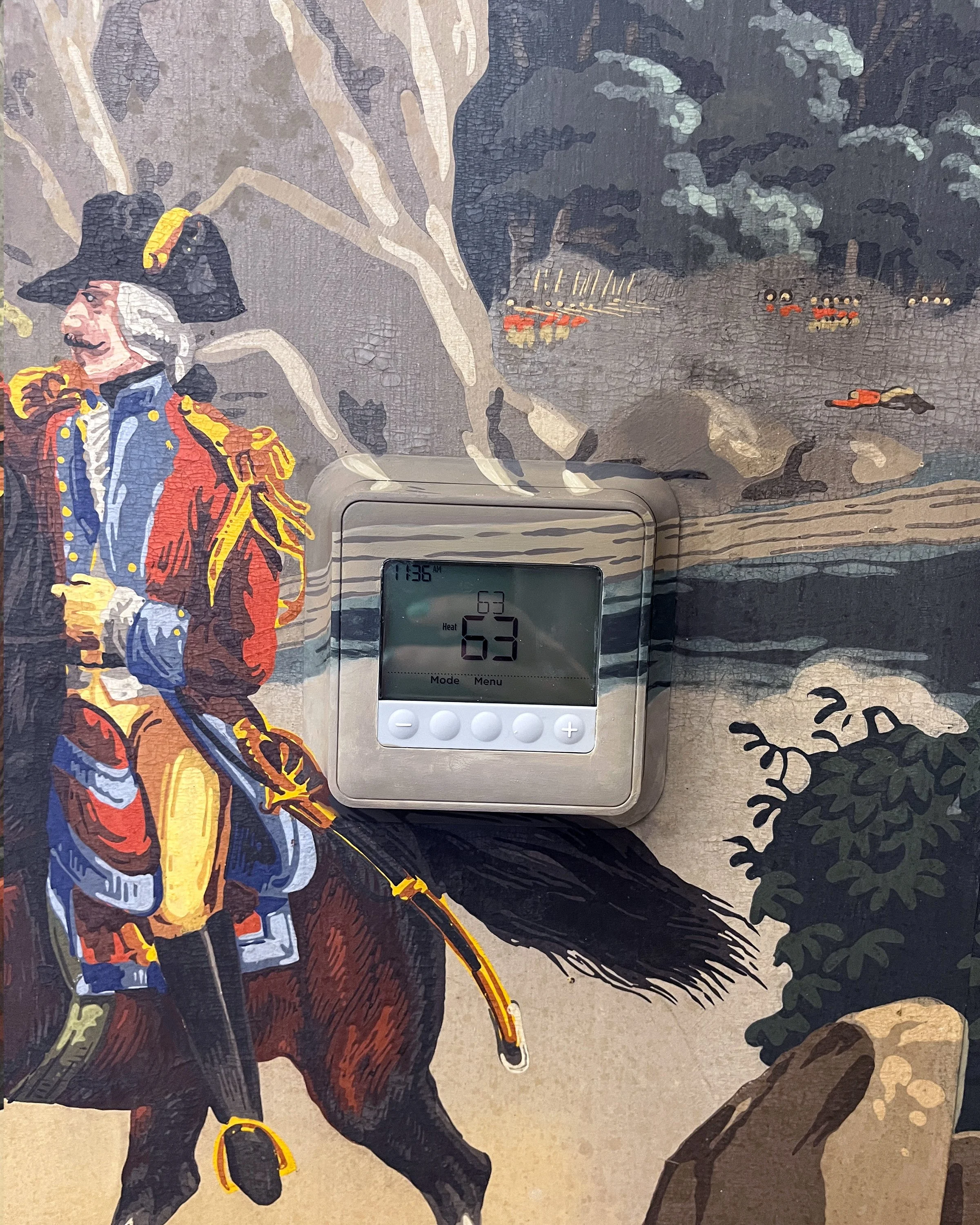 Hand-painted thermostat integrated into scenic wallpaper - after painting