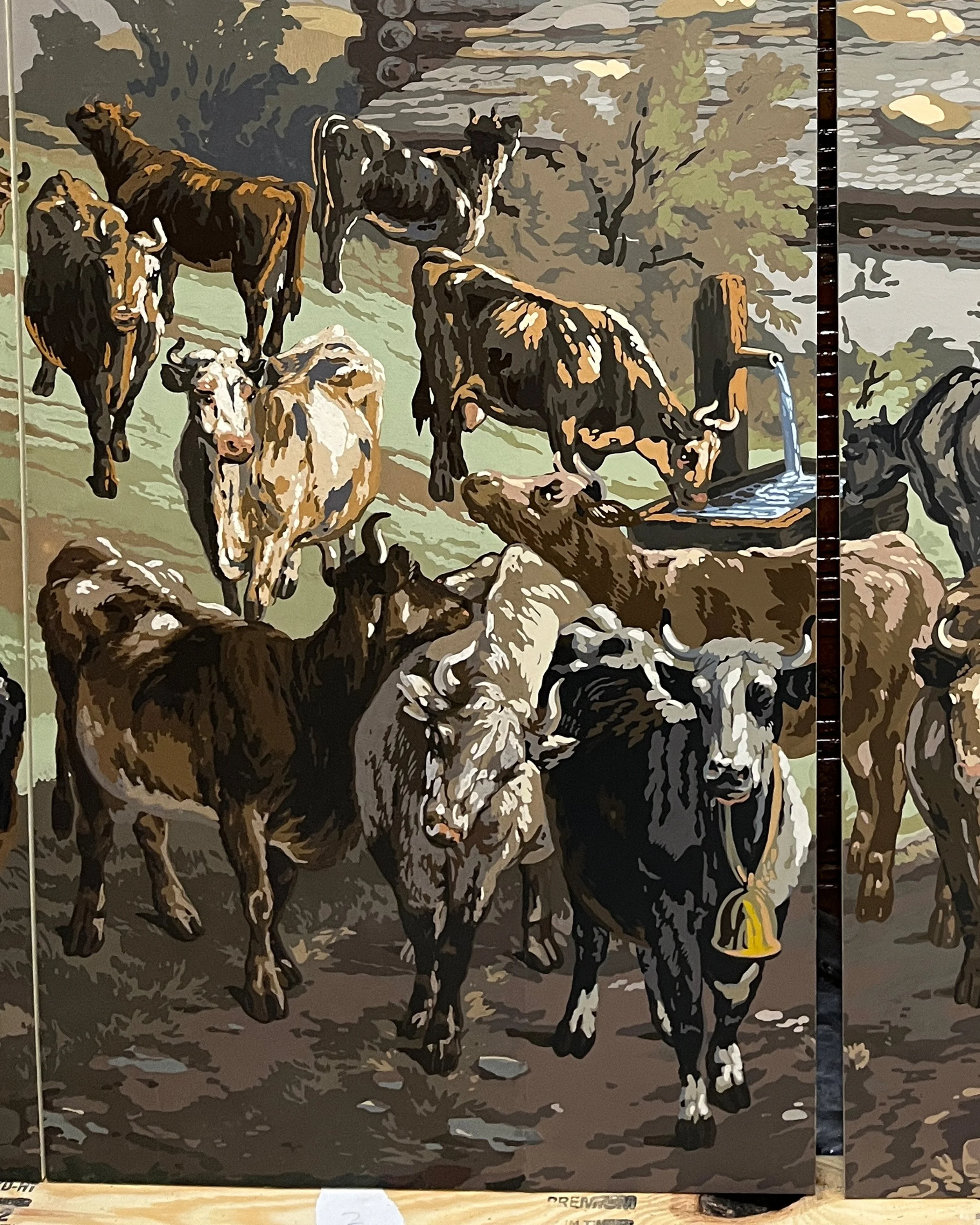 Hand-painting restored sections of panoramic wallpaper to match original design