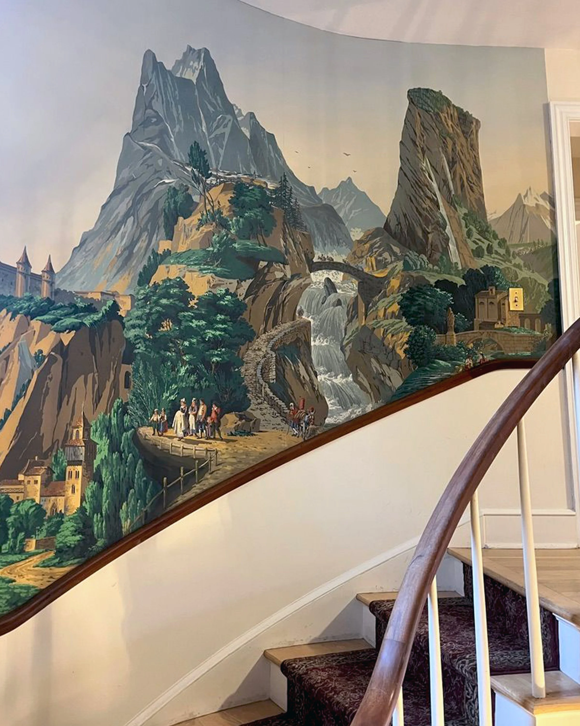 Zuber Les Vues de Suisse wallpaper installed along staircase at Greenwood Gardens after restoration