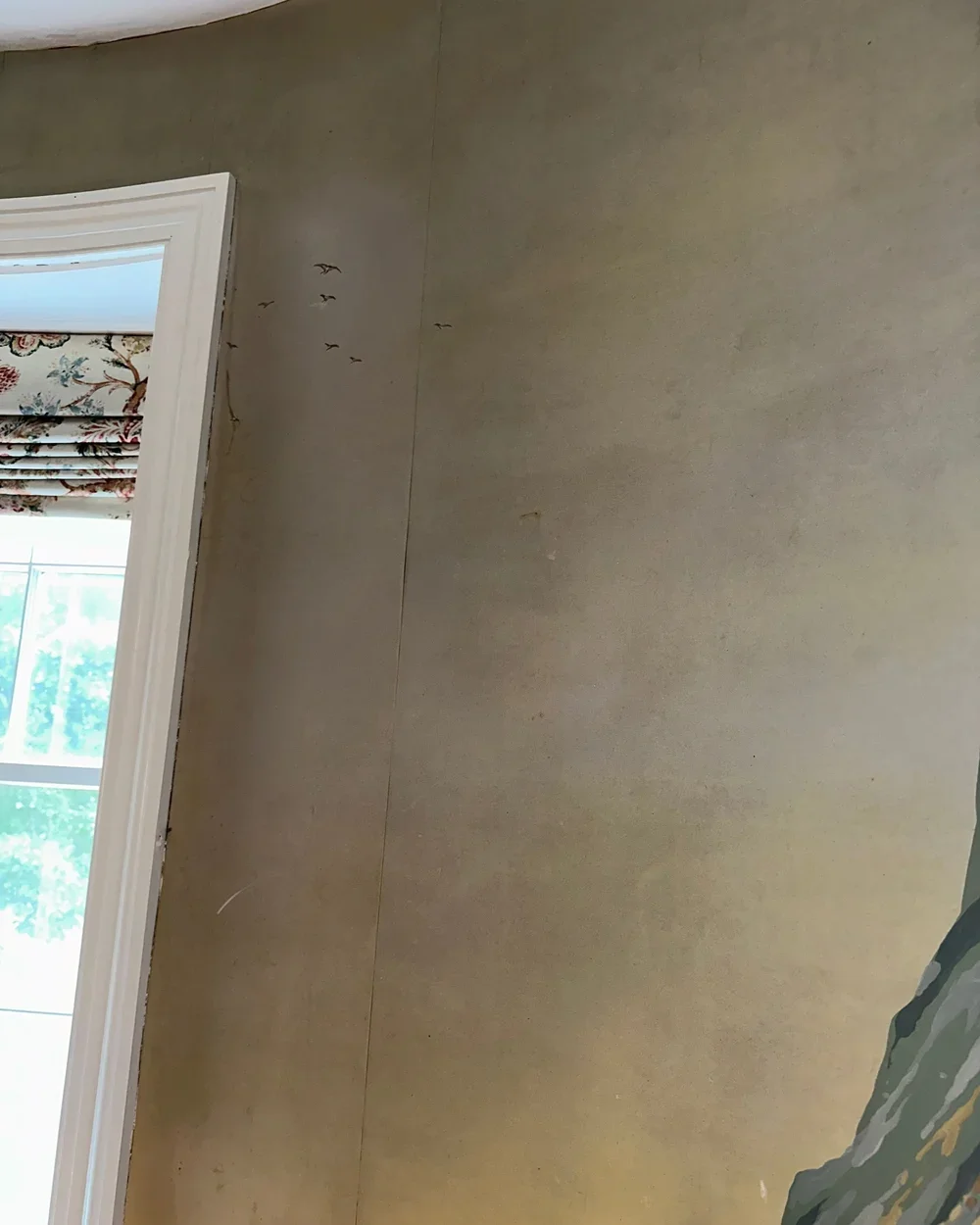 Zuber Les Vues de Suisse wallpaper before restoration showing fading, cracks, and water damage