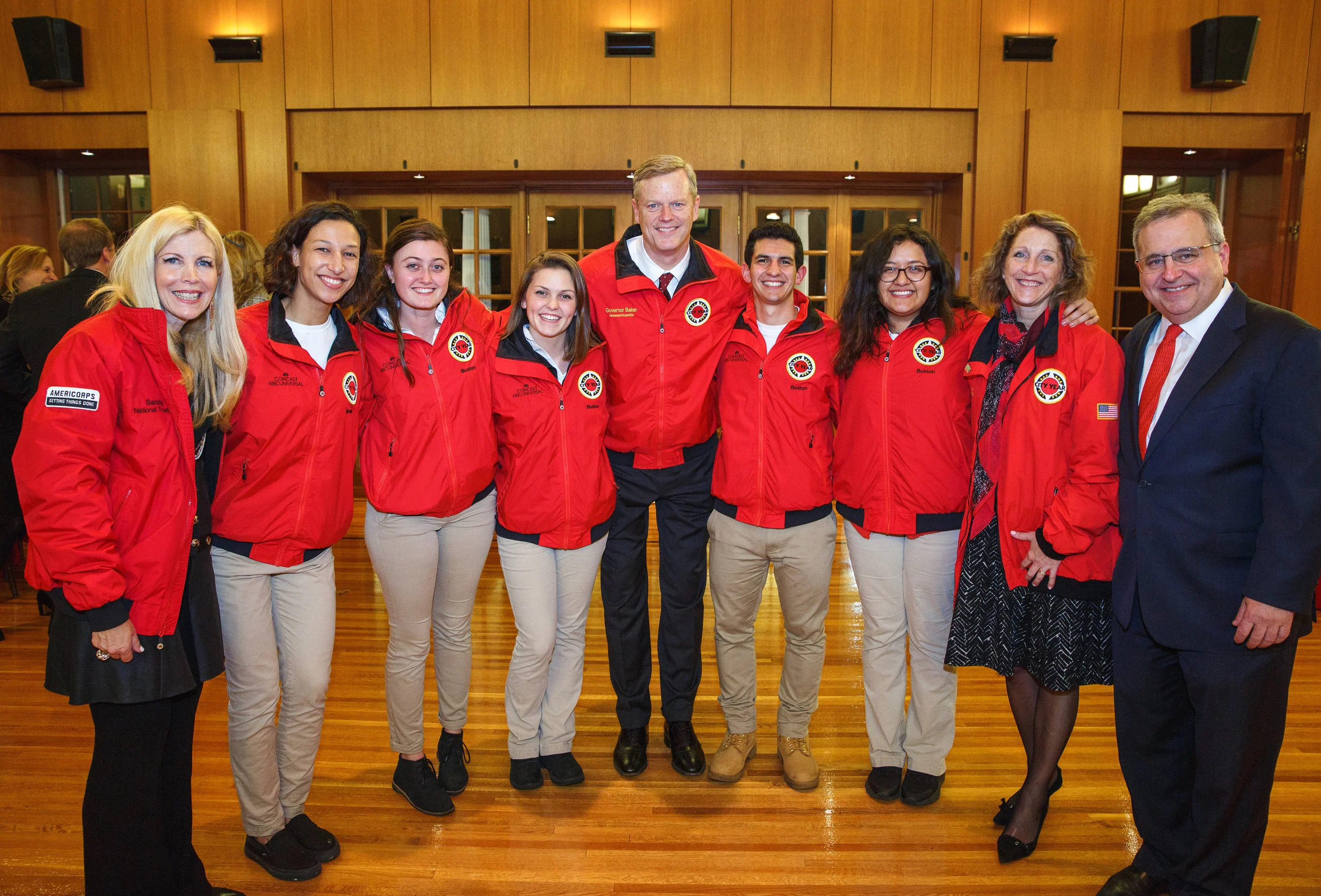 Governor Charlie Baker and his wife Lauren Baker with Sandy Edgerley, Michael Brown and City Year AmeriCorps members
