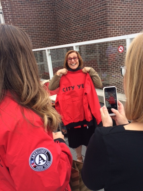 RJS Member Bari Harlam shows off her Red Jacket