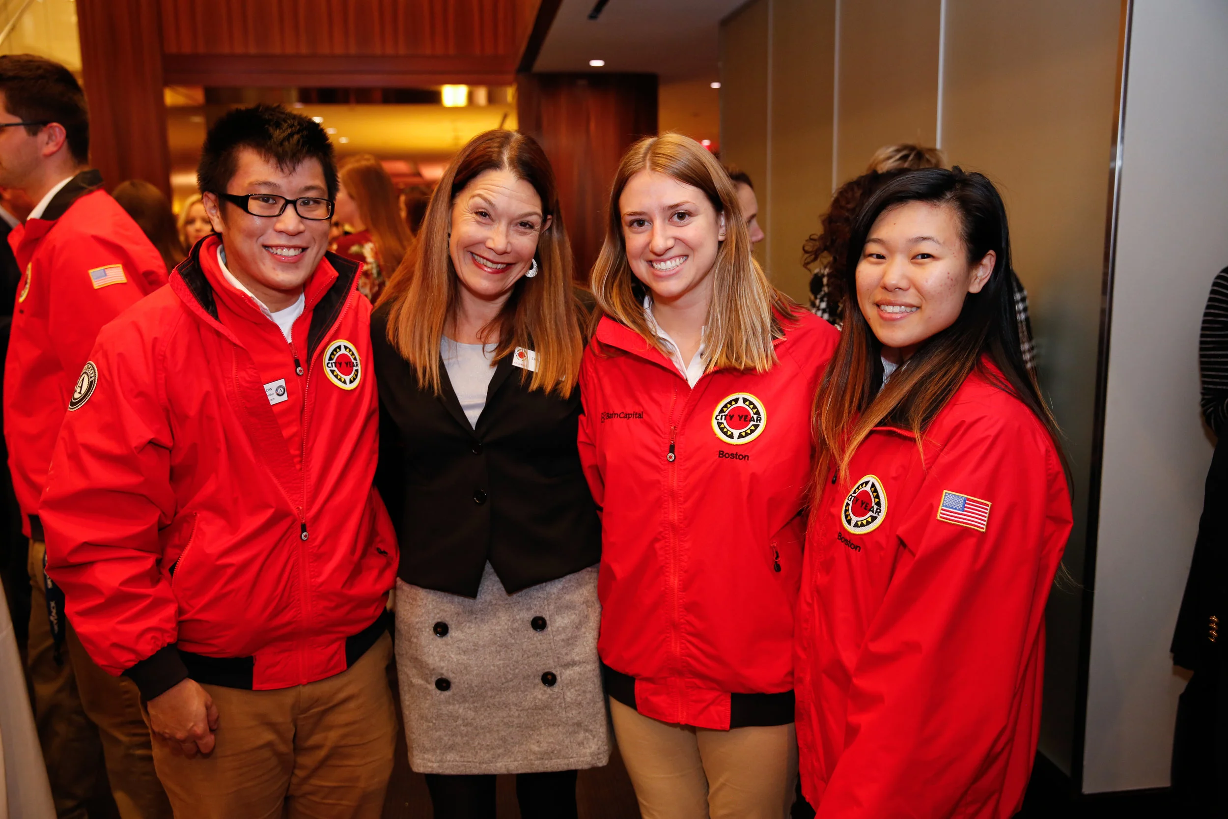 City Year Columbia RJS Chair, Shelley Canright, and City Year Boston AmeriCorps members Gary Chow, Becca Ebbot, and Jenna Kim at the Bain Capital Welcome Reception