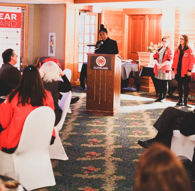 Toi Comer, City Year Cleveland Vice President and Executive Director, addresses the group