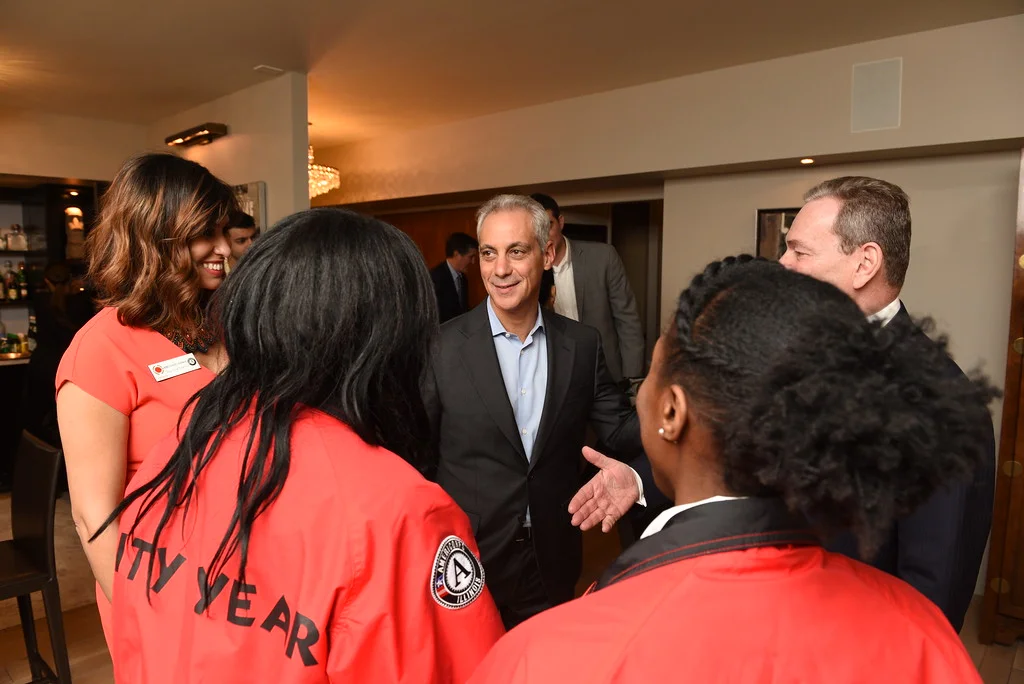 Mayor Rahm Emanuel speaking with City Year Chicago Executive Director Rebecca Nieves Huffman, City Year AmeriCorps member Kia Smith, Sierra Smith and Sam Mencoff
