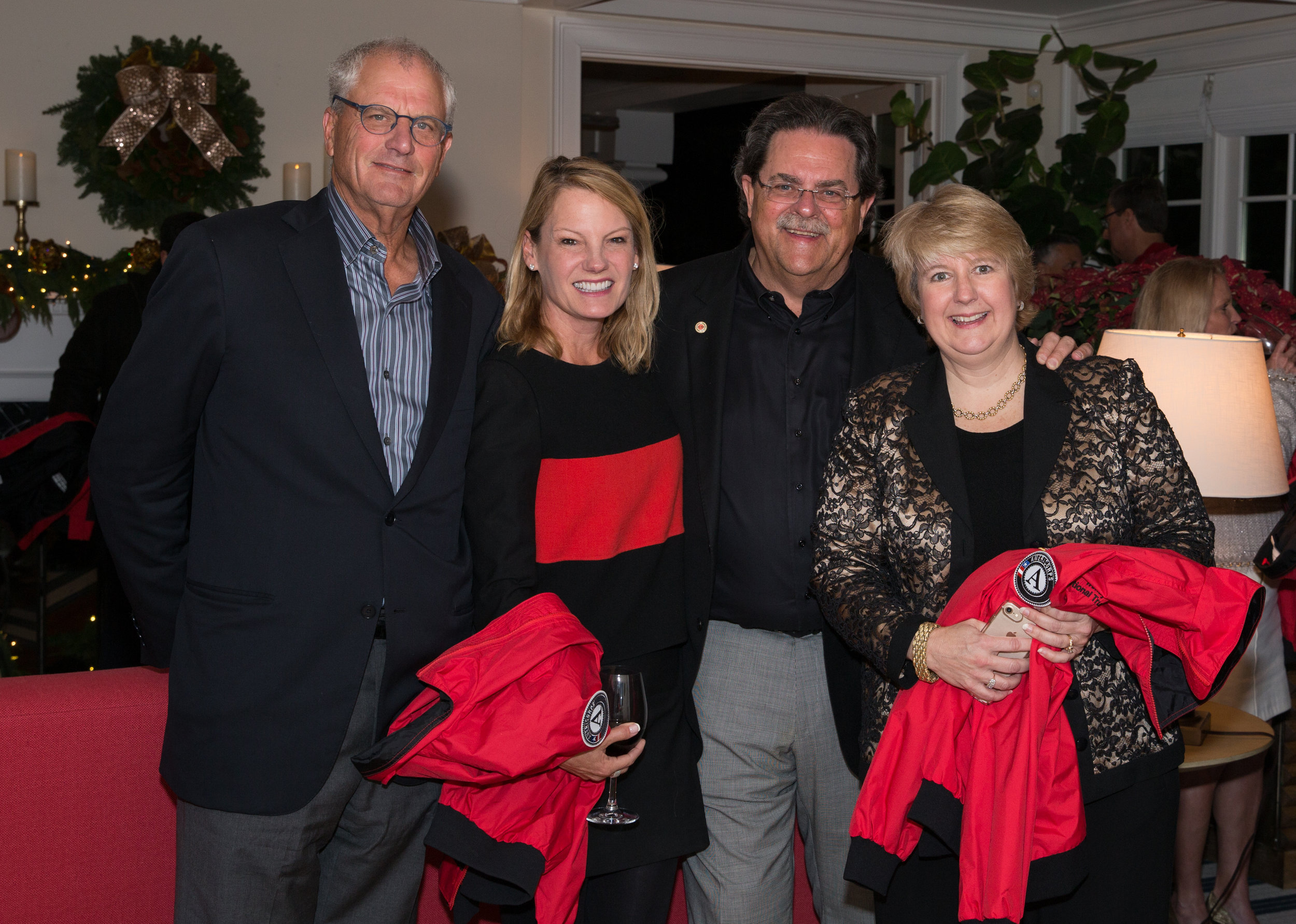 City Year Jacksonville RJS Members Jim Wiss, Ellen A. Wiss and Michael Ward with Wendy Spencer