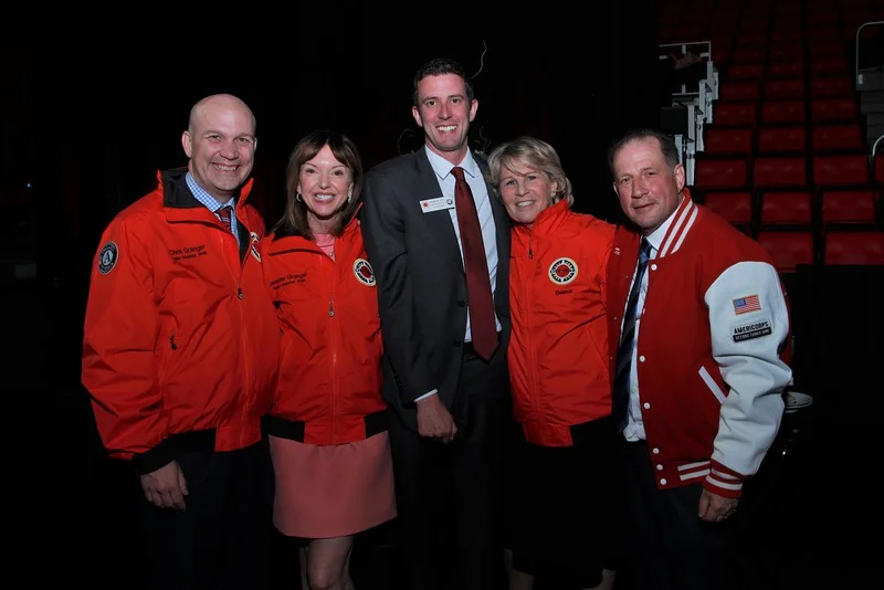 Jennifer and Chris Granger with Andrew Stein, City Year Detroit's Executive Director, Nancy Tellem and Arn Tellem, Vice Chairman for the Detroit Pistons