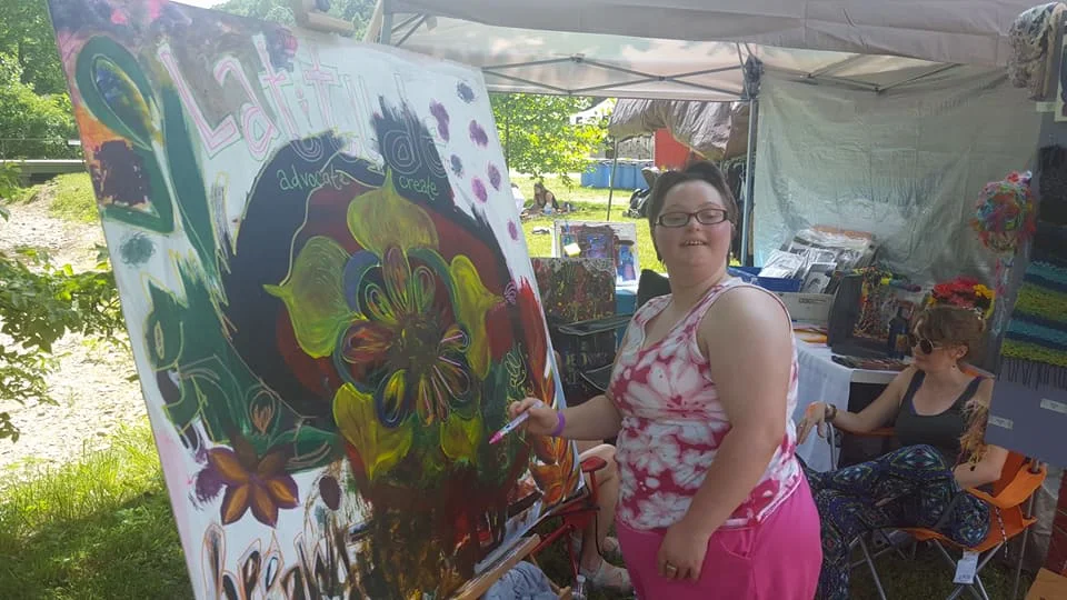 Maddison Parsons leading a collaborative painting workshop at PayTHINK2017