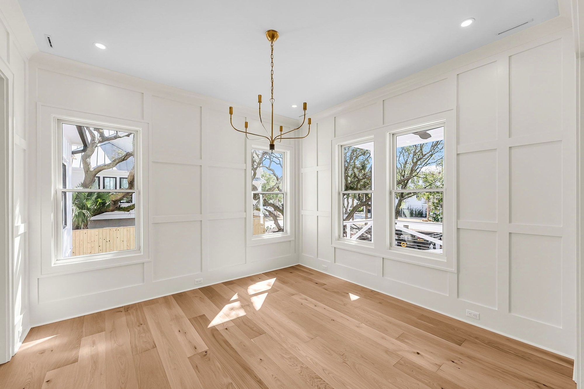 Owners suite bedroom in an elevated Isle of Palms SC custom home by Iconic Developments
