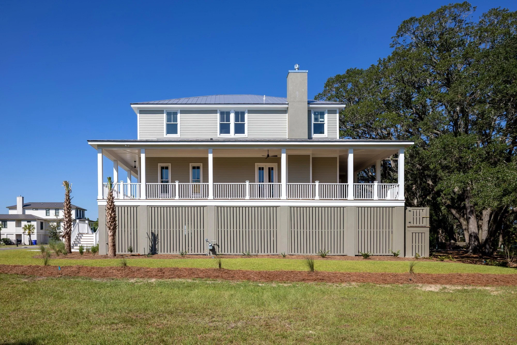 Side elevation with a masonry chimney on a custom Johns Island SC Lowcountry home