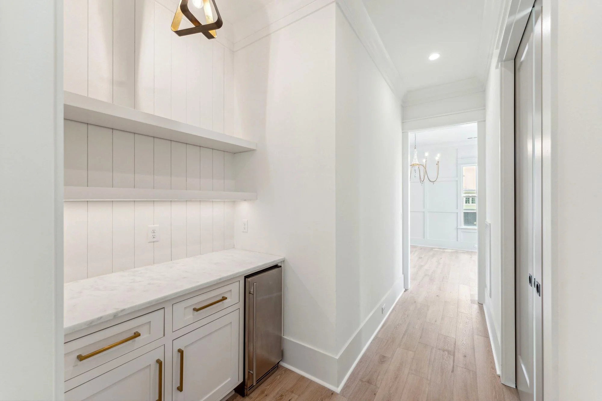 Custom walk-in butler pantry with custom inset cabinetry in a Daniel Island luxury build
