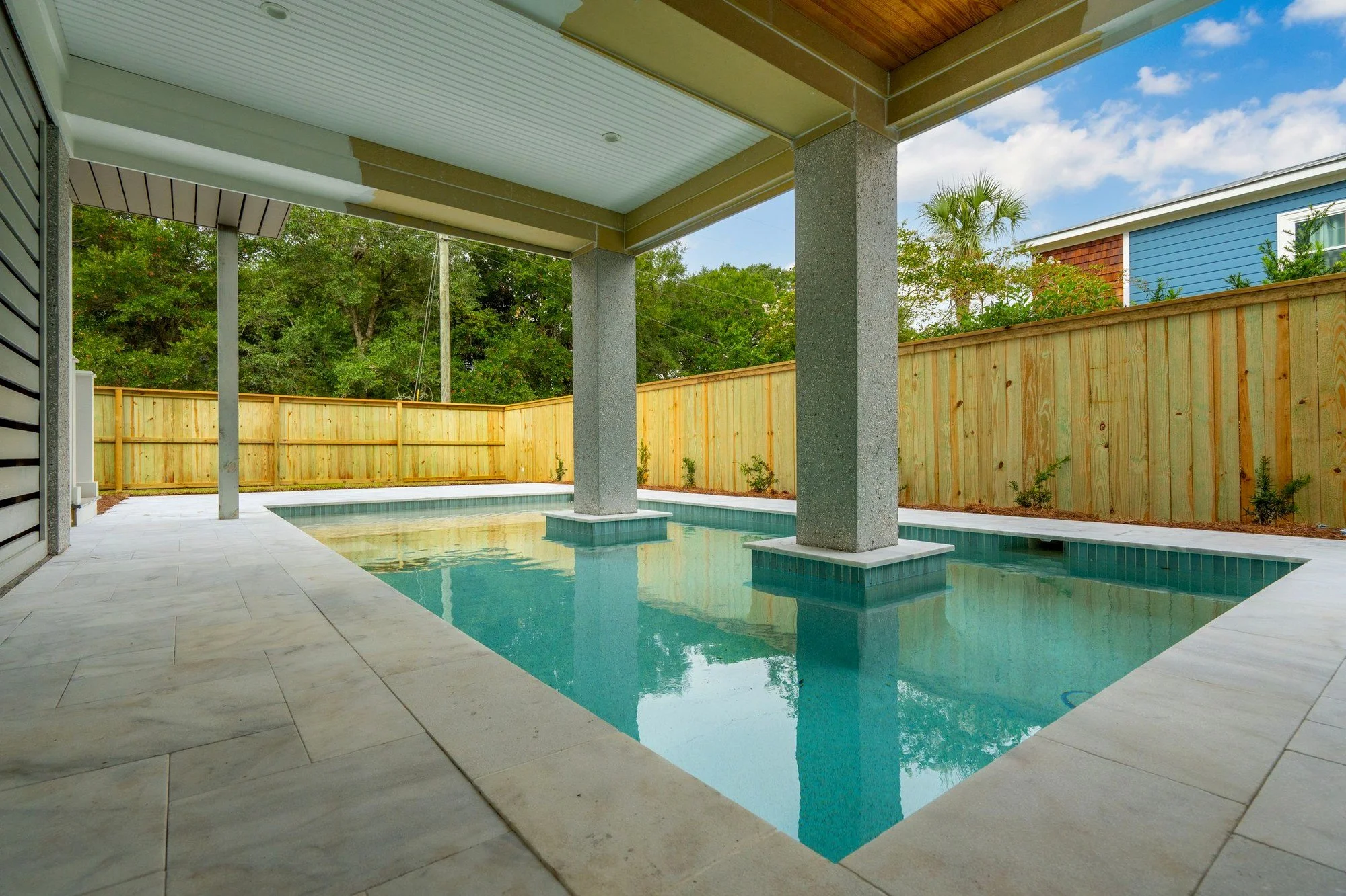 Gunite pool and covered terrace at a custom Isle of Palms SC home by Iconic Developments