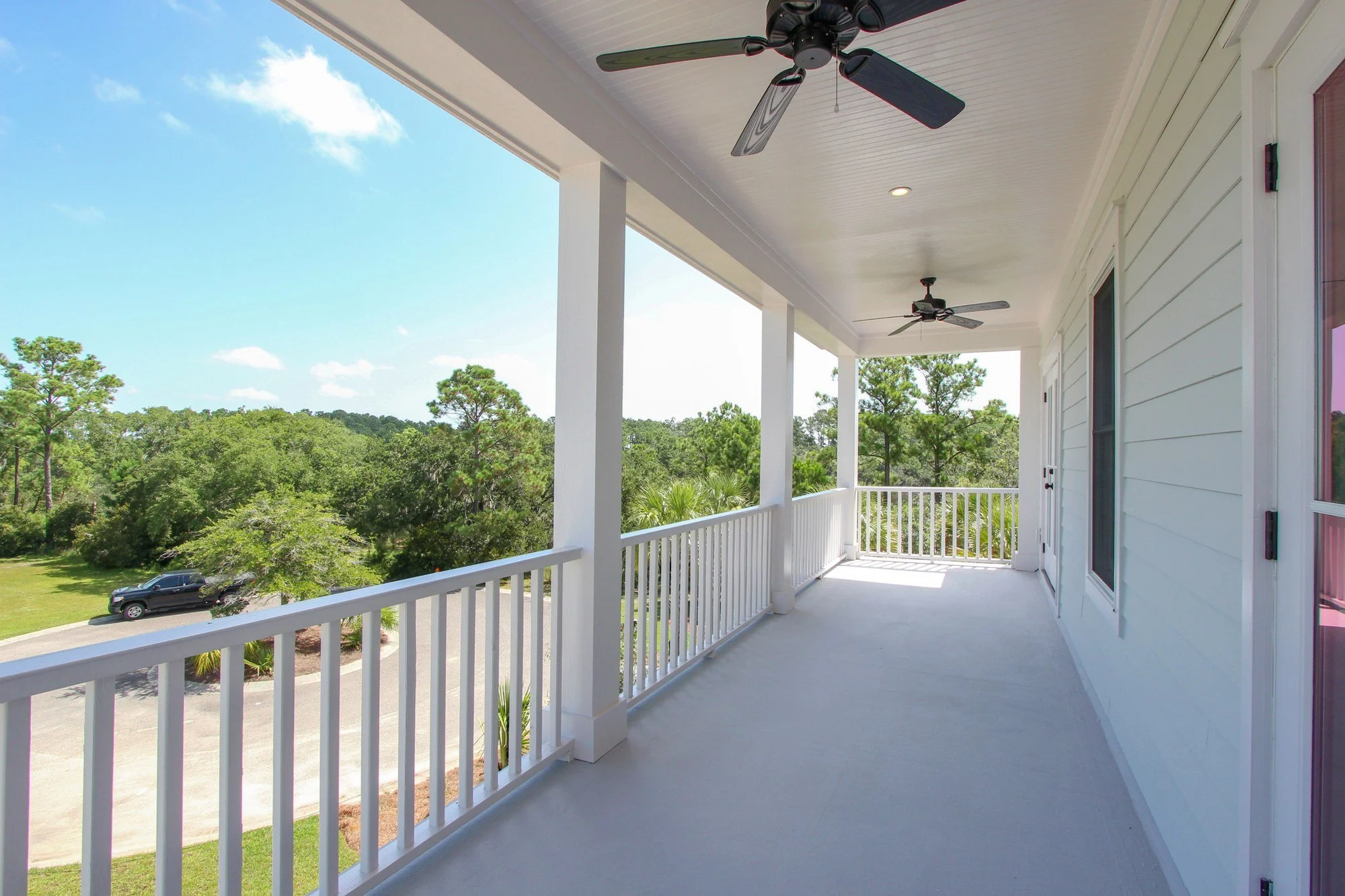 Deep front porch overlooking the lawn at 1805 Rushland Grove Lane Johns Island SC