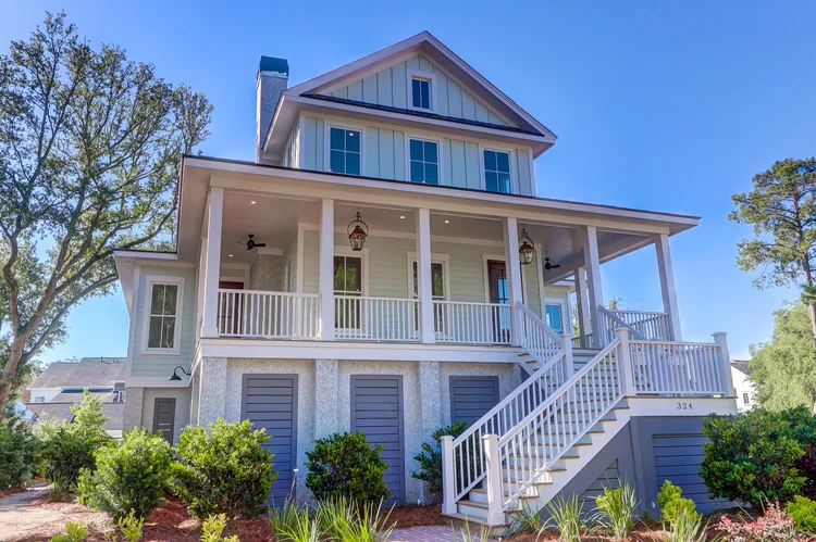 Elevated custom home on Chimney Back Street in Ralston Grove, Daniel Island SC, built by Iconic Developments