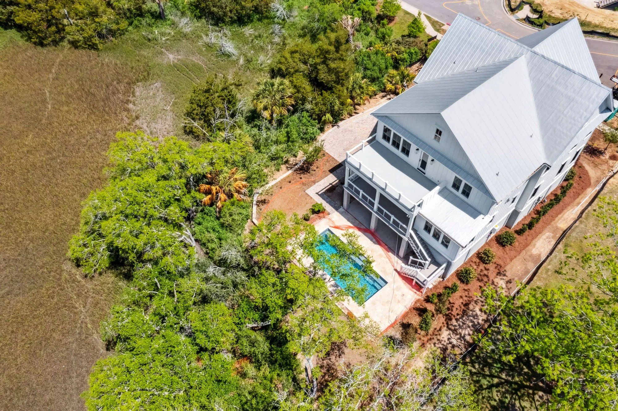 Custom swimming pool and elevated rear yard at 807 Dunham Street by Iconic Developments