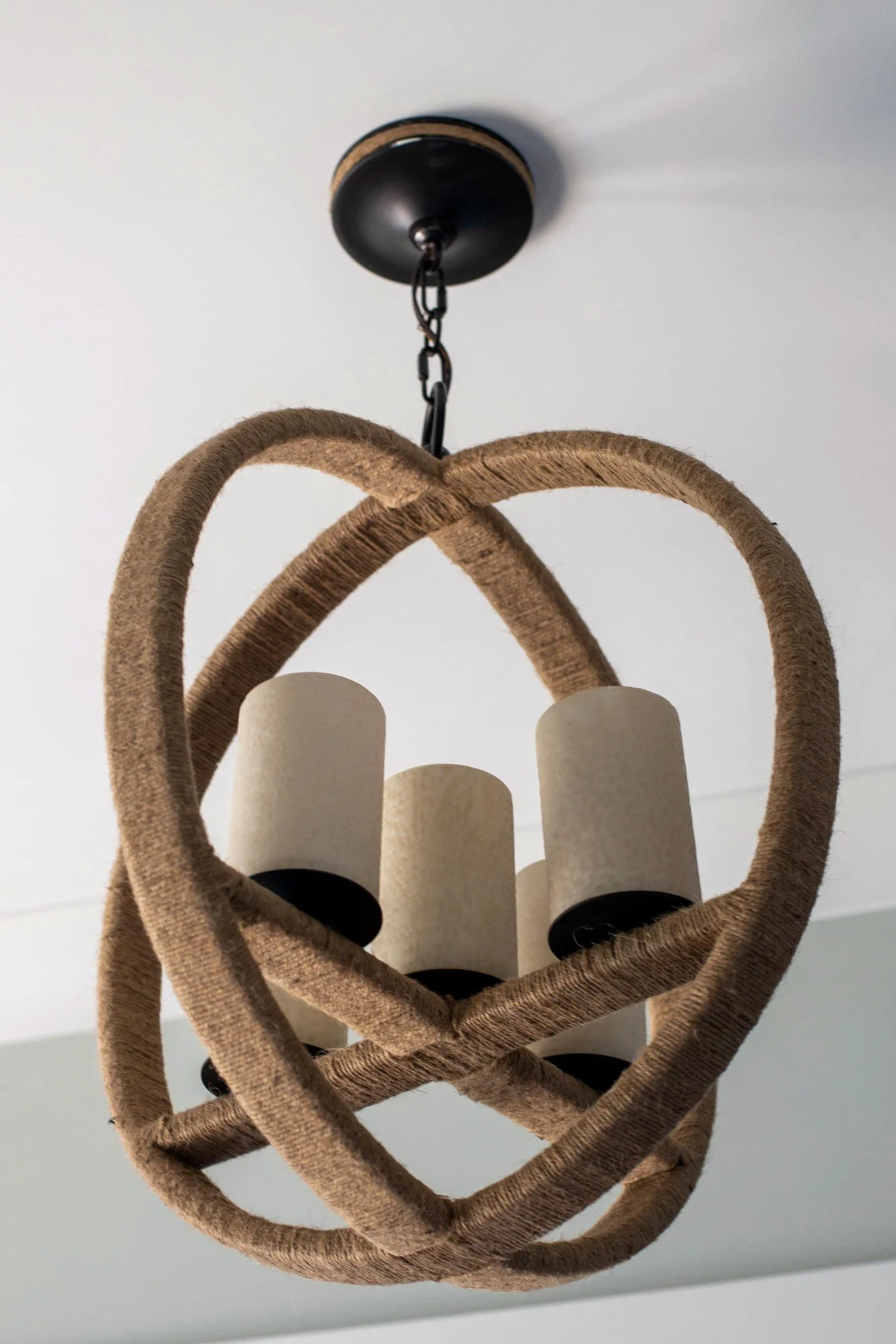 Rope orb chandelier detail in a coastal Charleston SC home by Iconic Developments