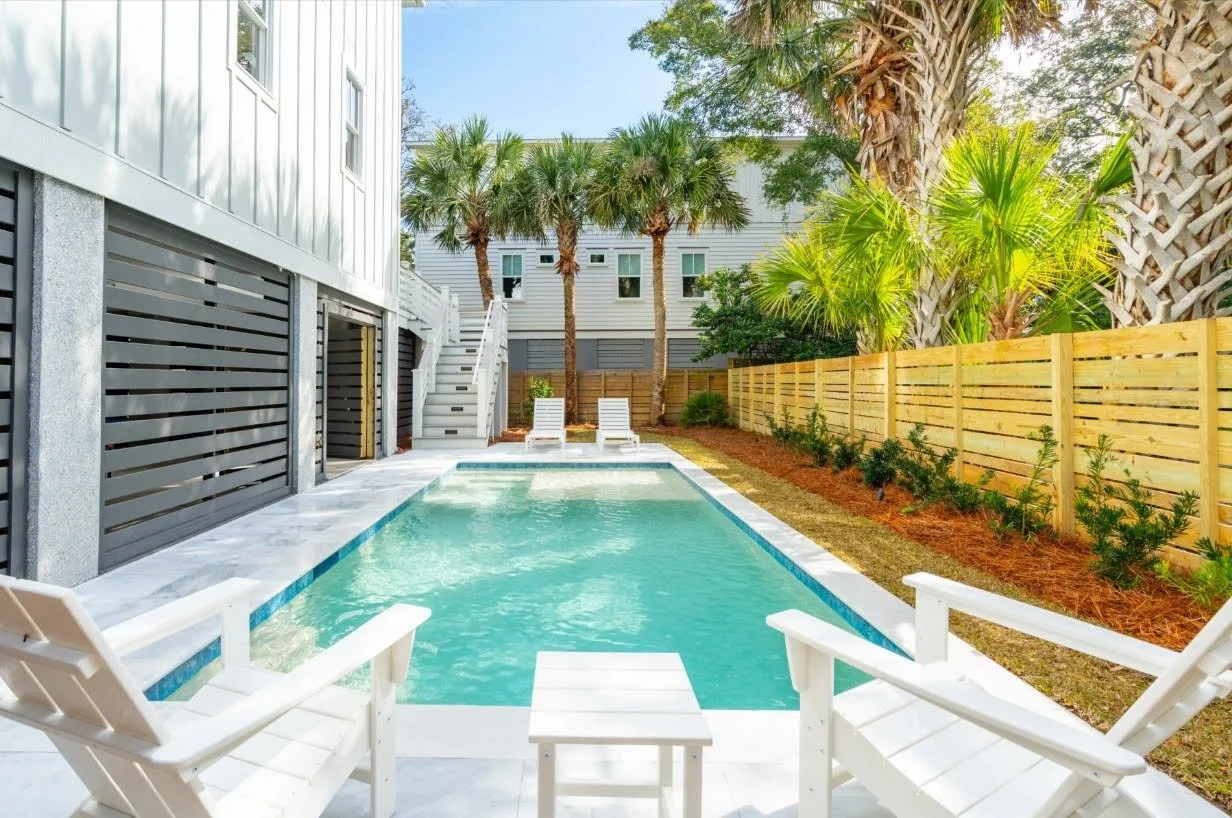 Custom pool and marble pool deck at an Isle of Palms SC home by Iconic Developments