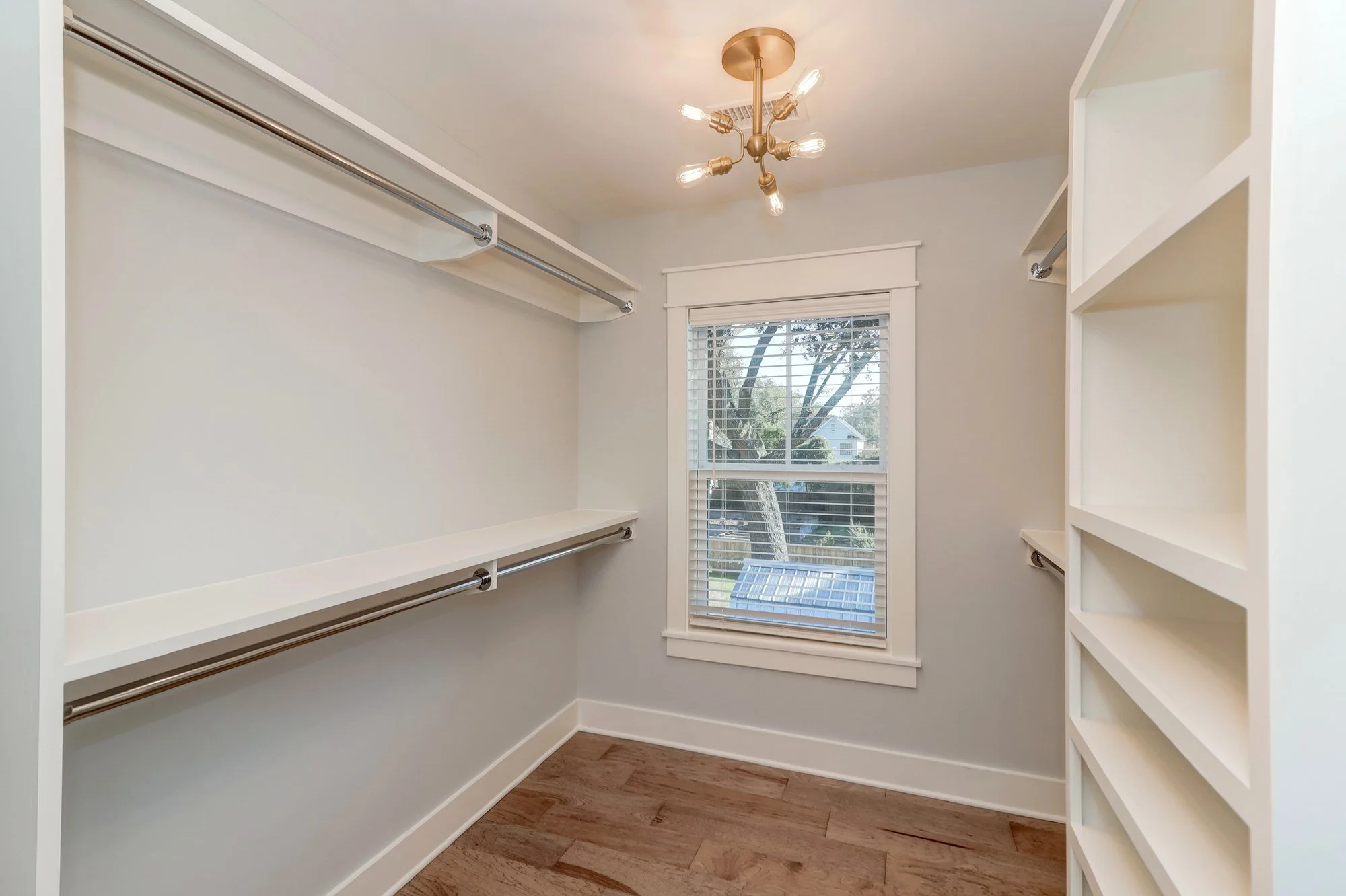 Custom owners walk-in closet in a Mount Pleasant SC luxury home by Iconic Developments