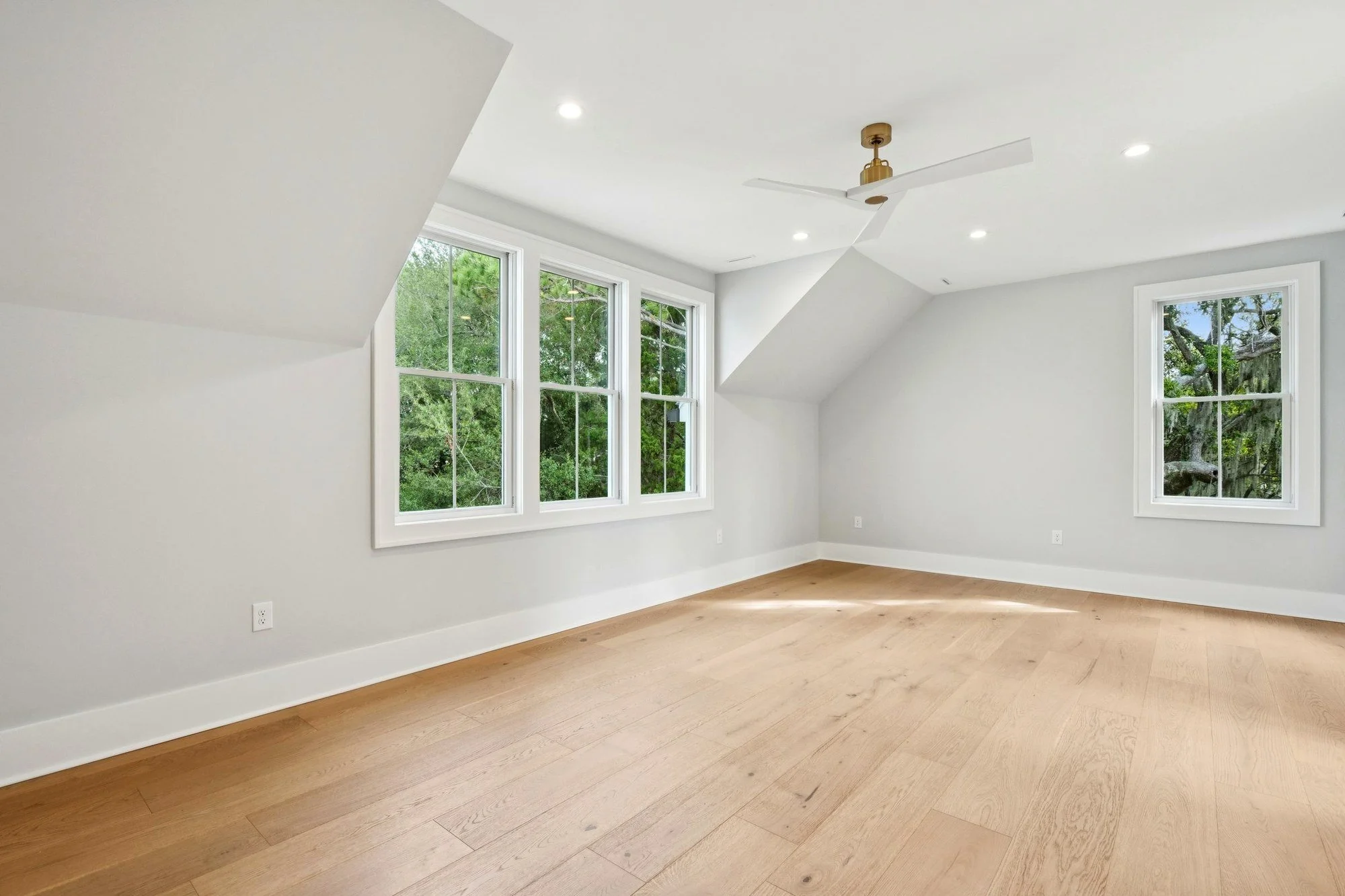 Bonus room with dormer windows in an Isle of Palms SC custom home by Iconic Developments