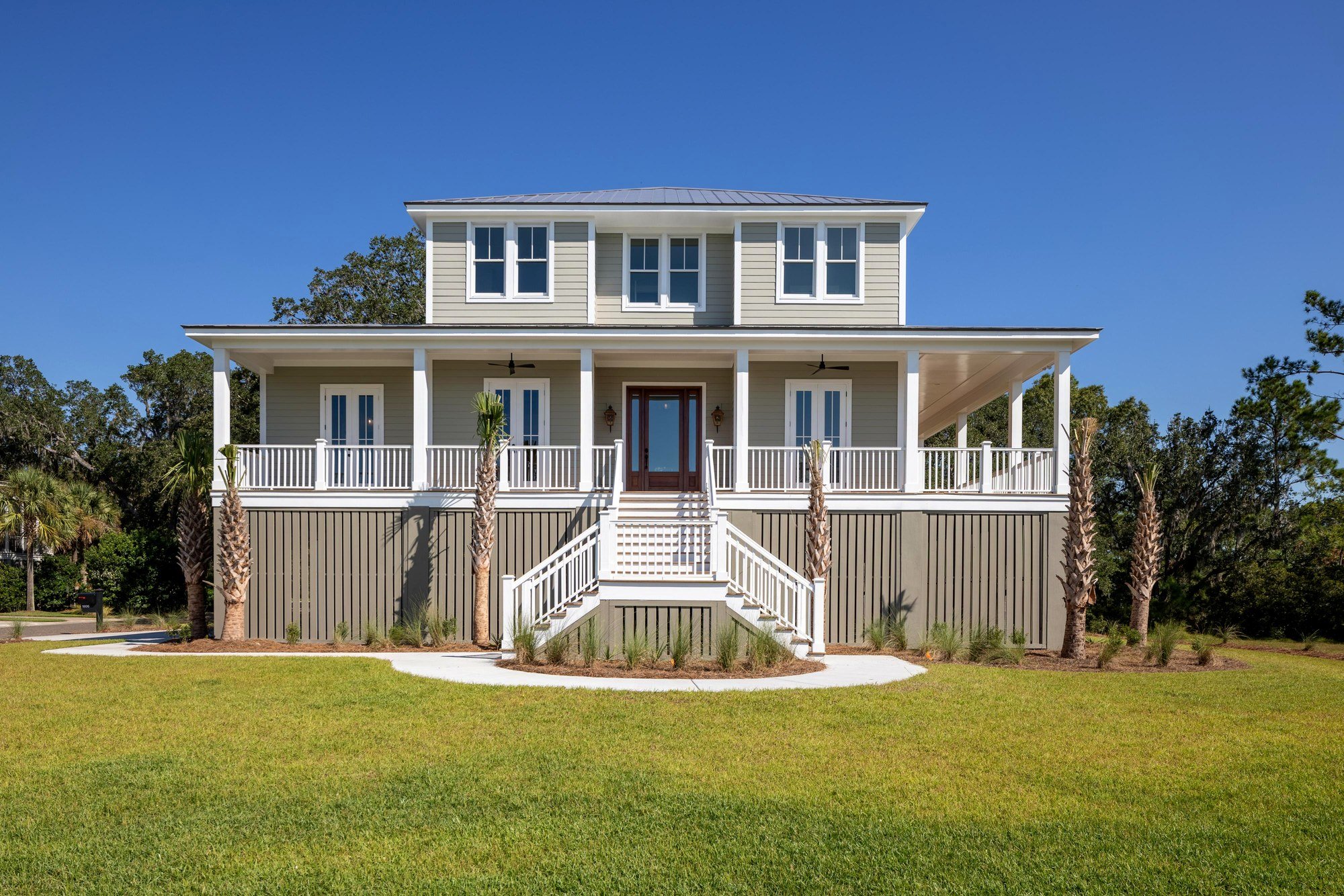 1806 Rushland Grove Lane — Lowcountry home with standing-seam metal roof on a wooded lot, Johns Island, built by Iconic Developments