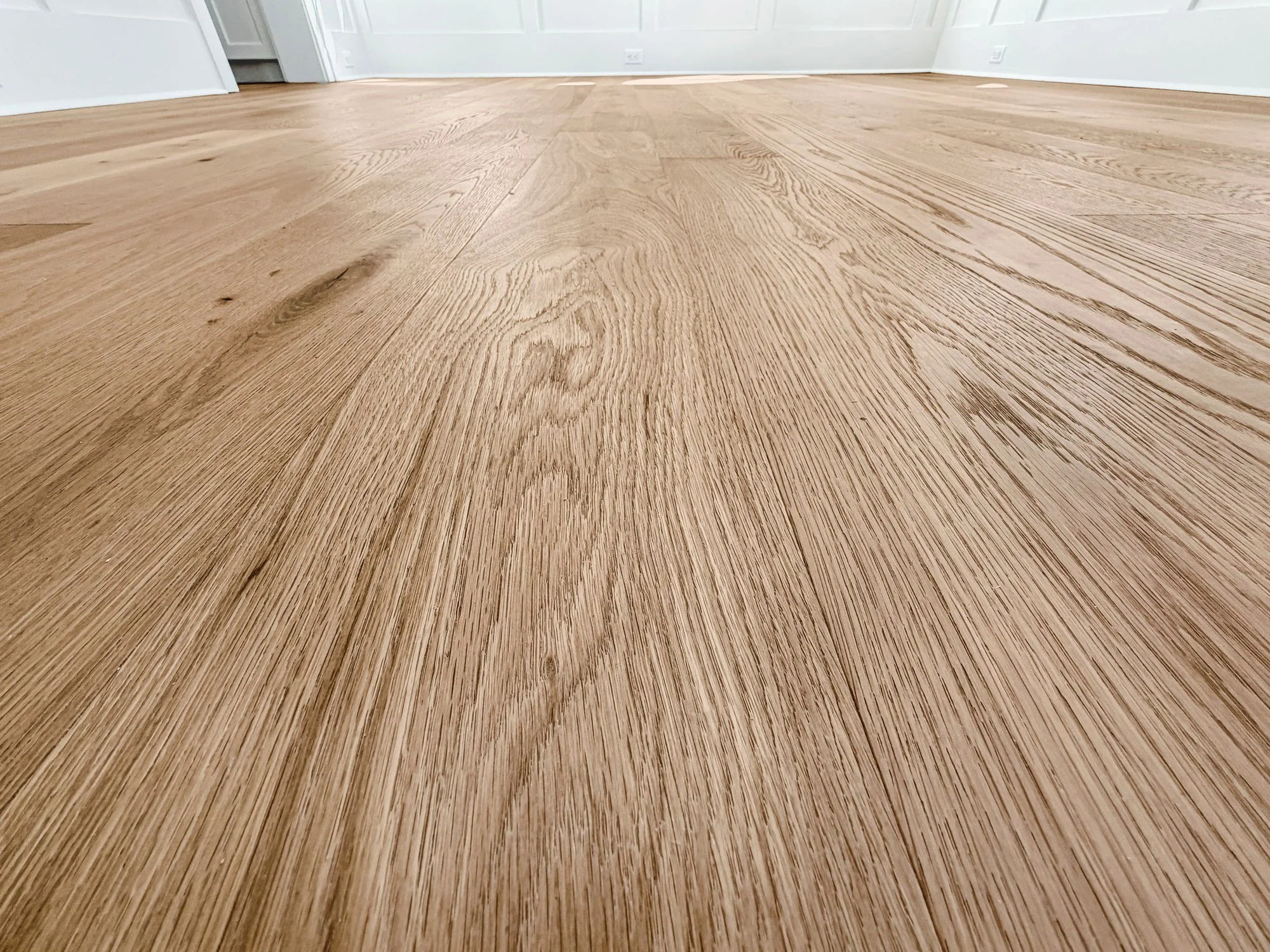 Wide plank white oak flooring detail in an Isle of Palms SC home by Iconic Developments