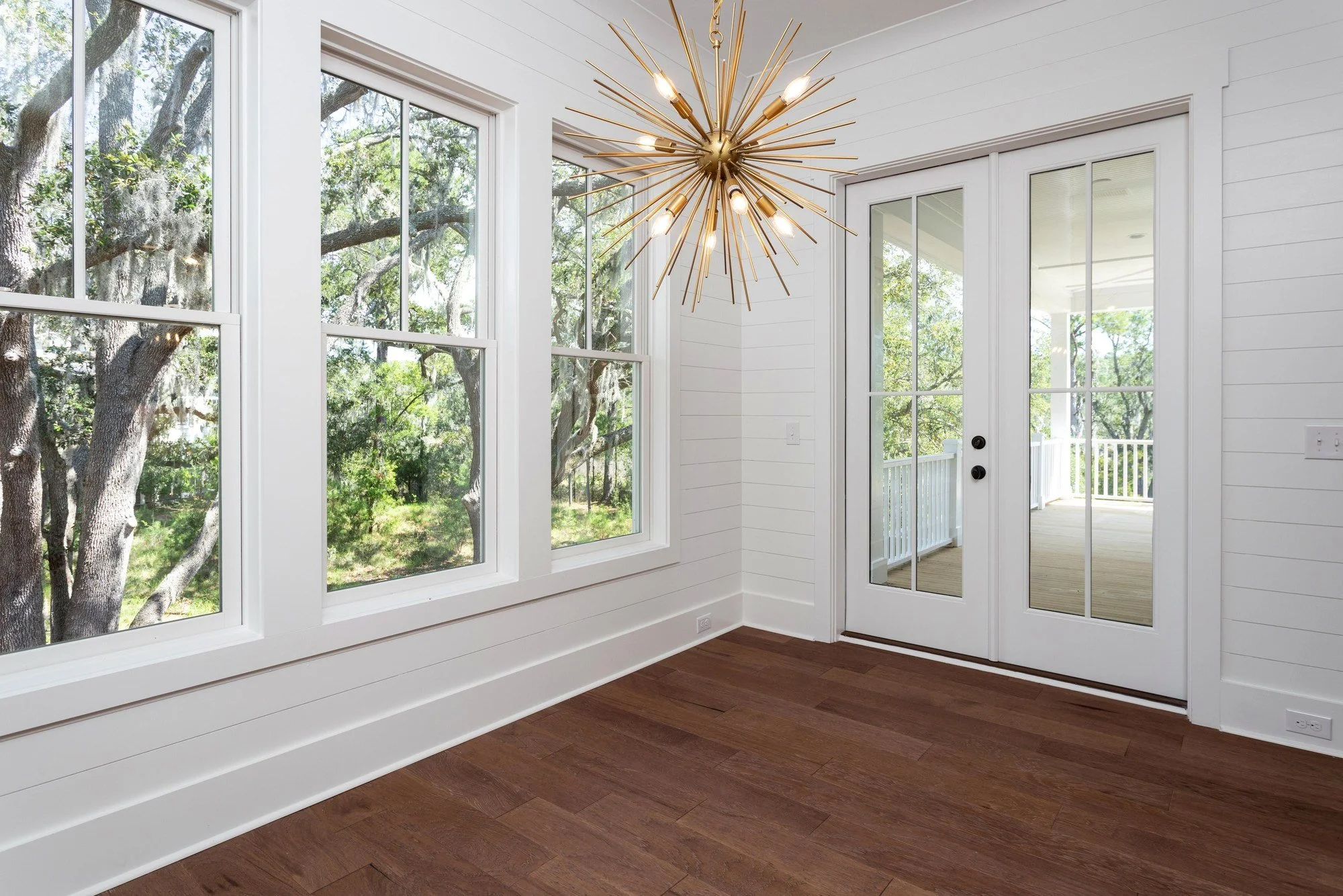 Flex room with sputnik chandelier in a Johns Island SC home by Iconic Developments