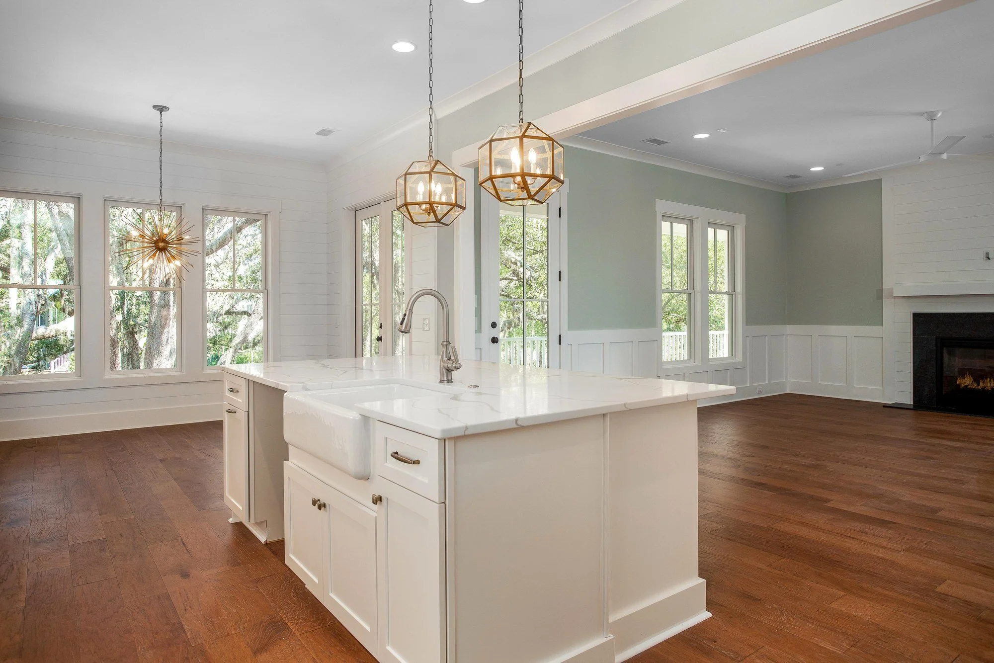 Kitchen island with farmhouse sink in a custom Johns Island SC Lowcountry home build
