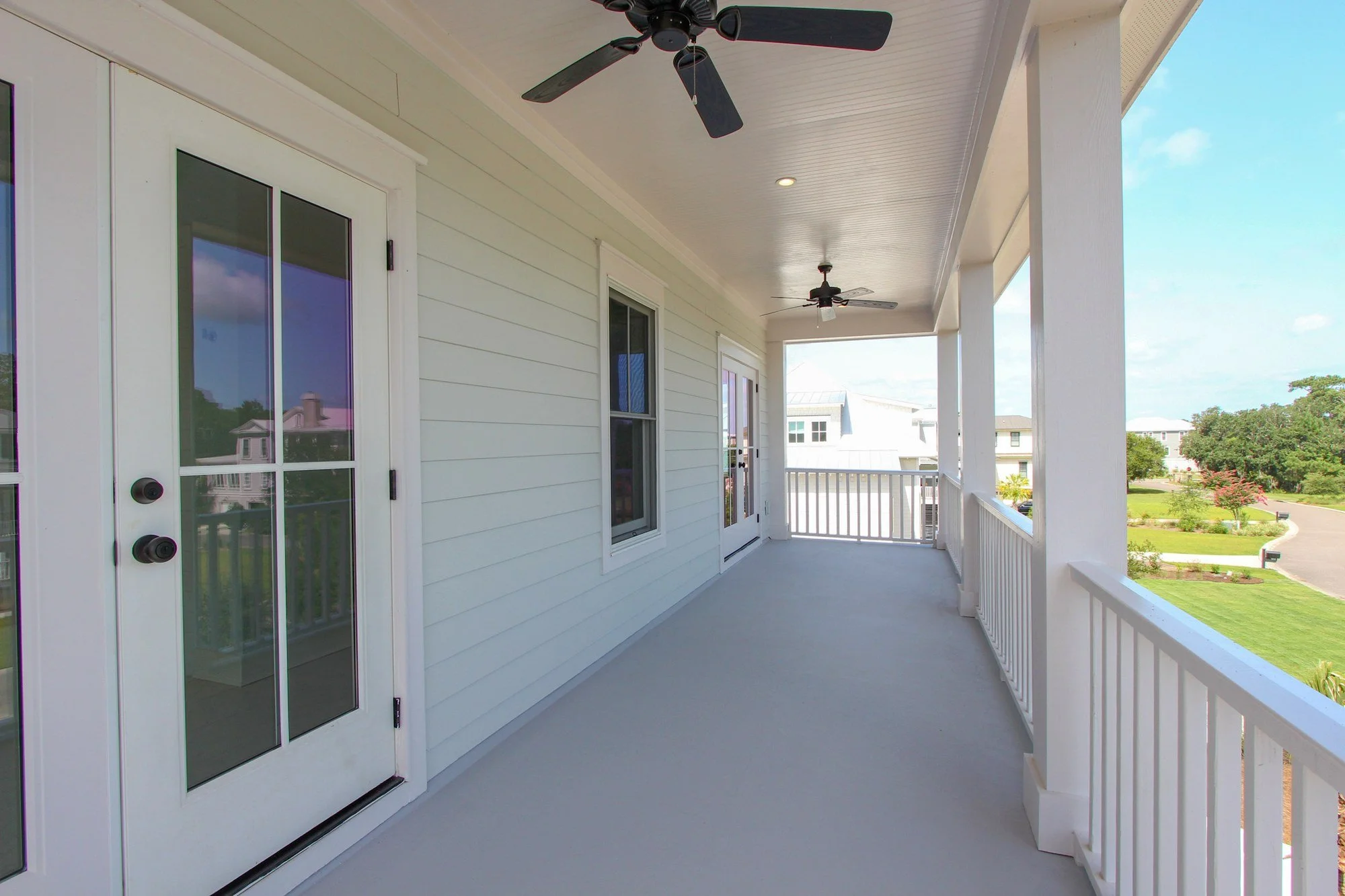 Front porch French doors on an elevated Lowcountry custom home in Charleston SC