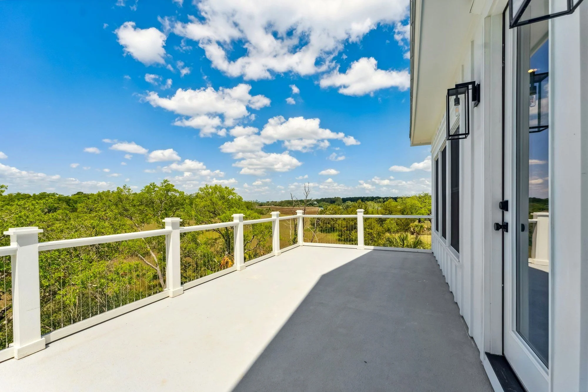 Open upper deck with marsh and Cooper River views at 807 Dunham Street Daniel Island SC