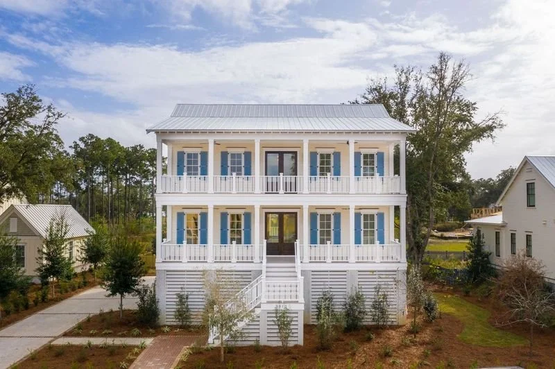 Captain's Island — elevated custom home on a pier foundation in Daniel Island Park, built by Iconic Developments