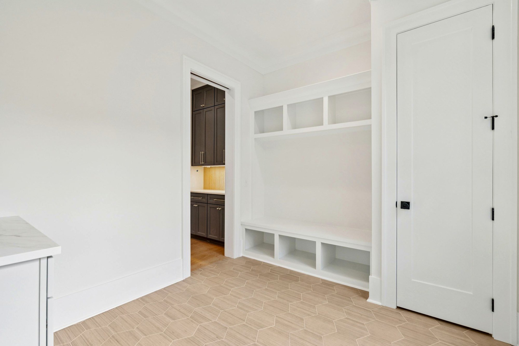 Mudroom with custom built-in lockers in an Isle of Palms SC home by Iconic Developments