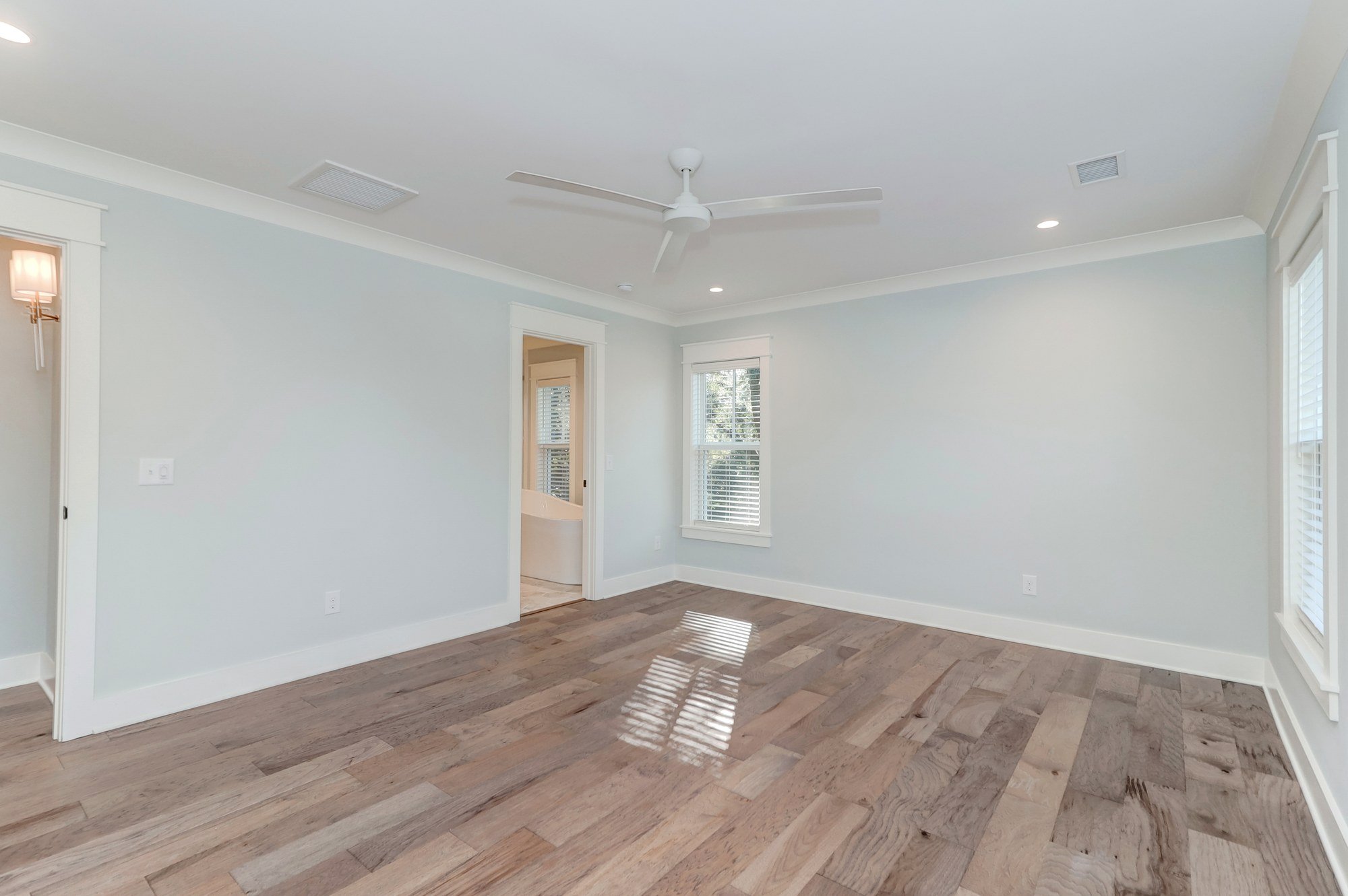 Owners suite window wall with natural light in a Mount Pleasant SC custom home build