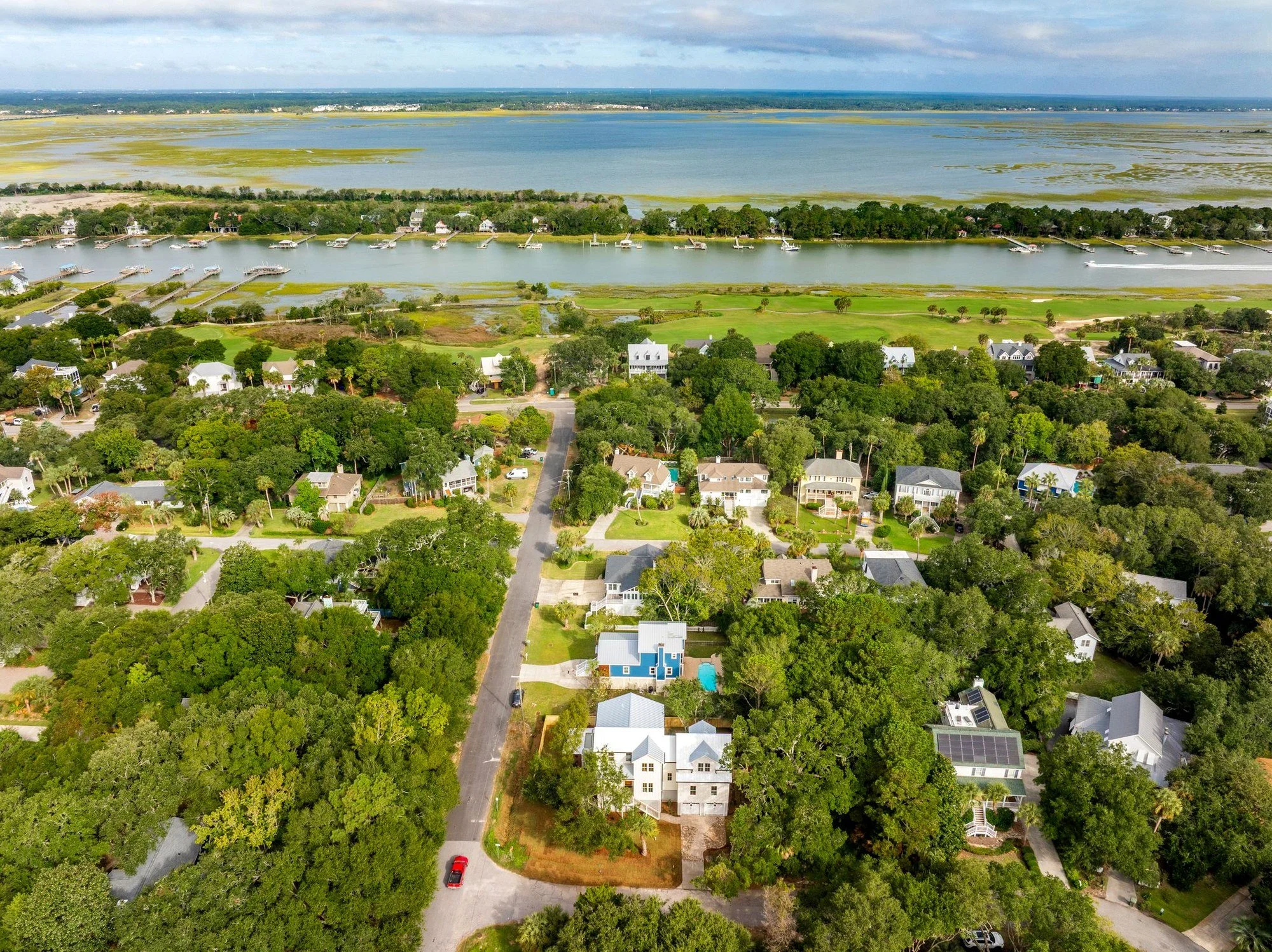 Aerial view of marsh and golf course views surrounding an Isle of Palms SC custom home