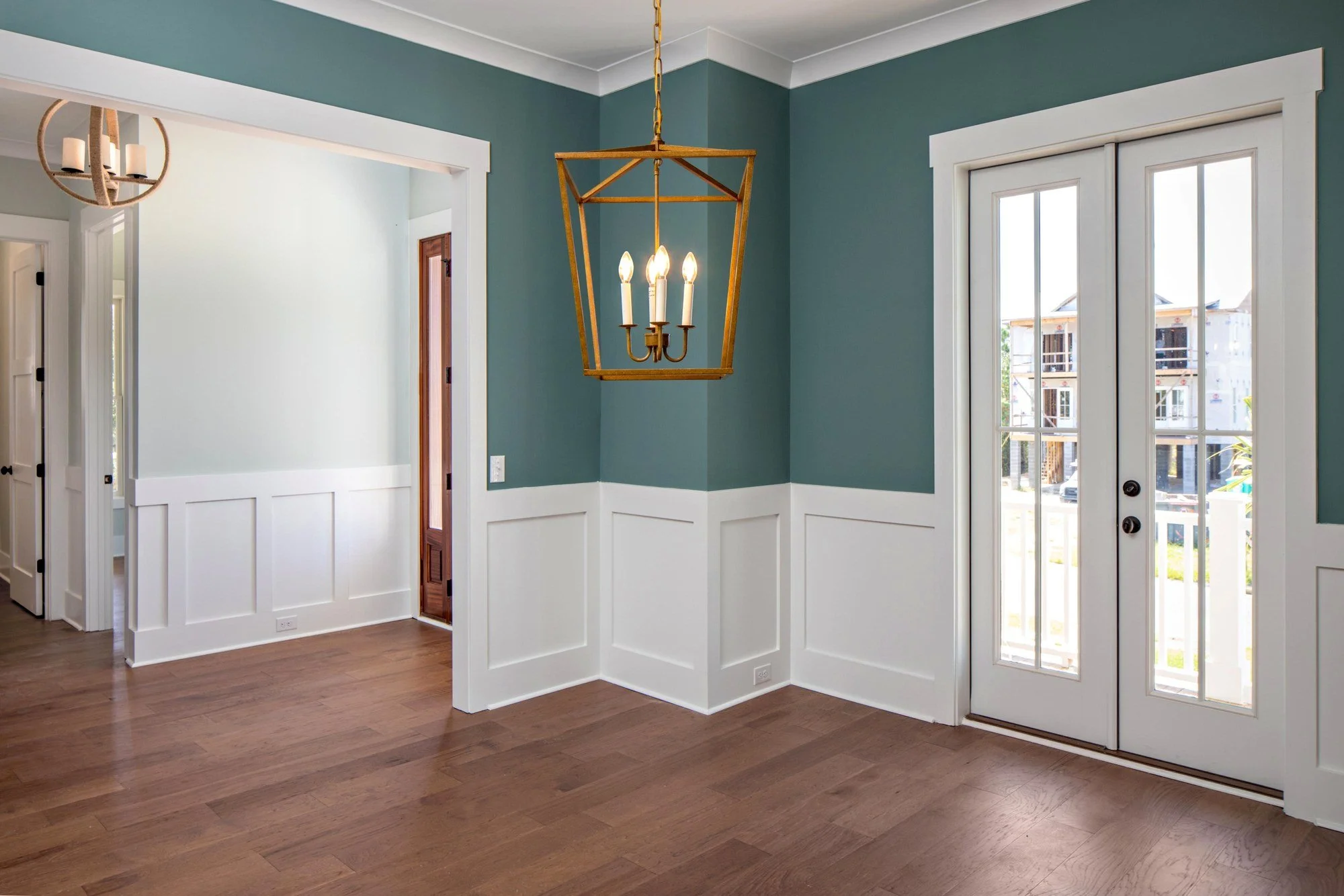 Dining room with board-and-batten wall detail in a Charleston SC custom home build