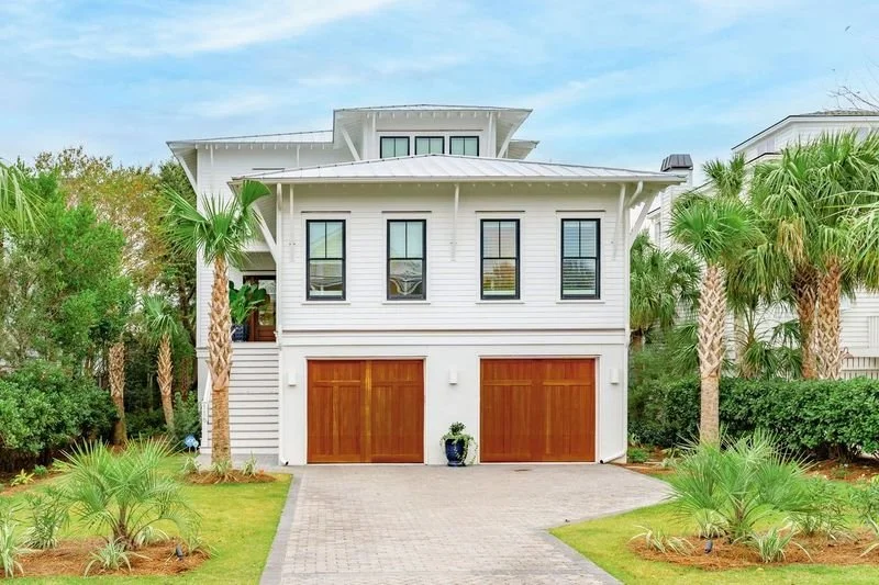 Charleston Blvd — elevated coastal home one block off the beach, Isle of Palms. Iconic Developments represented the buyer