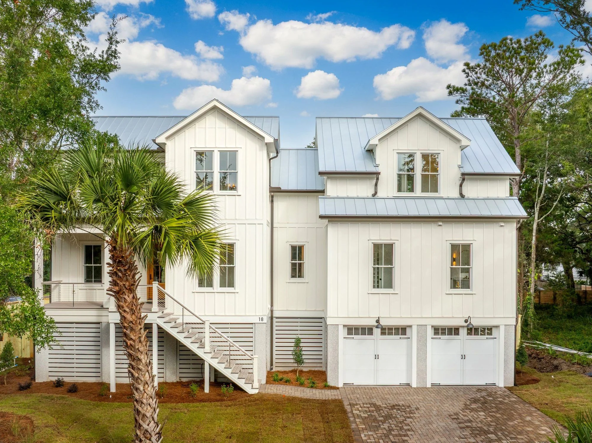 18 Wills Way — elevated custom home with standing-seam metal roof and covered gunite pool, Isle of Palms, built by Iconic Developments