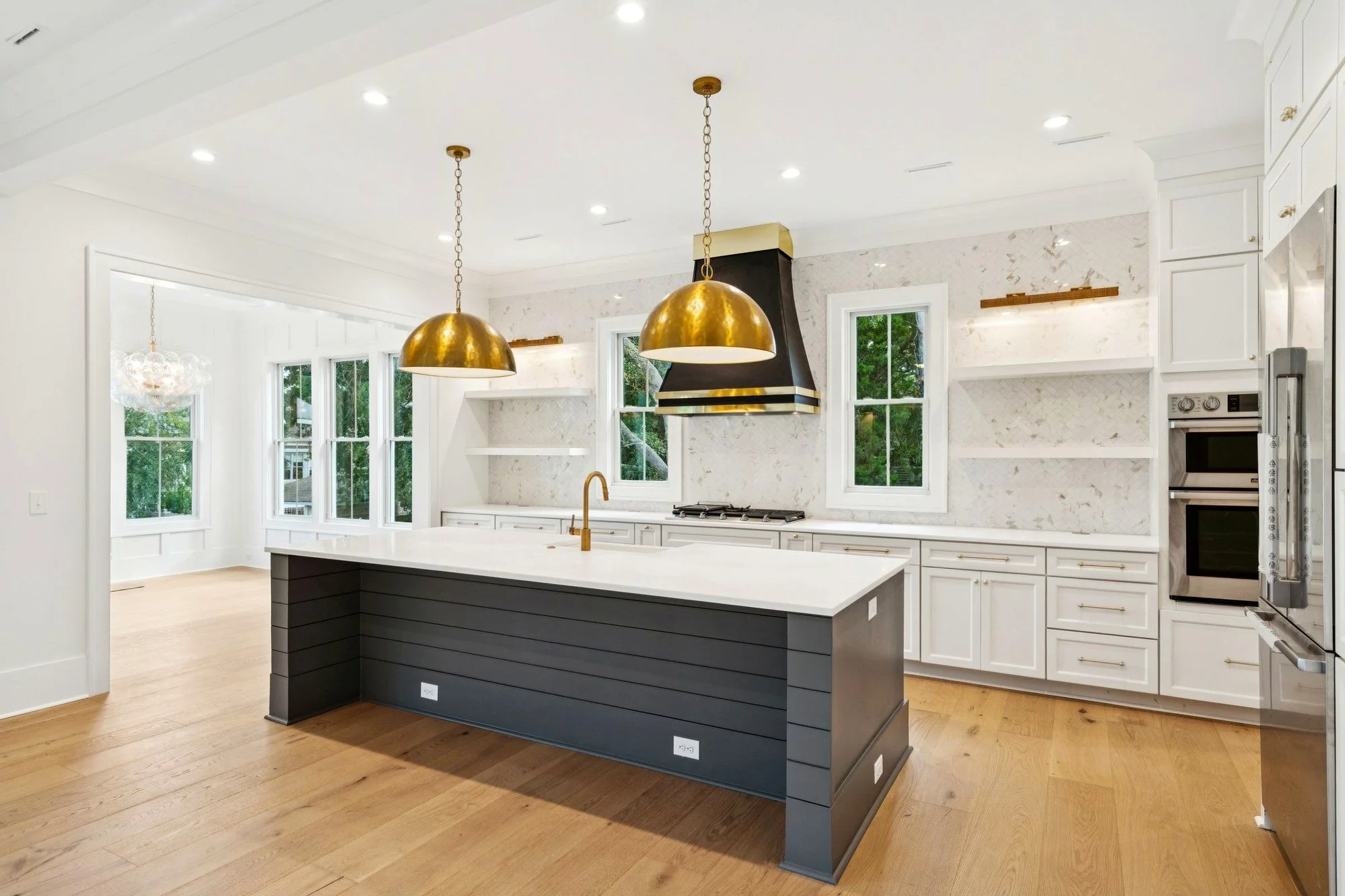 Custom kitchen island in a coastal Isle of Palms SC home built by Iconic Developments