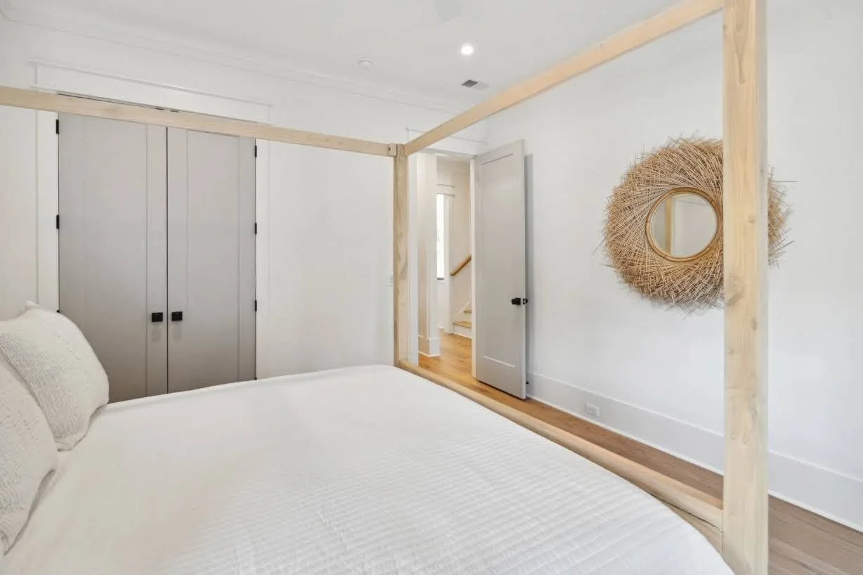 Main level guest bedroom in an Isle of Palms SC custom home by Iconic Developments