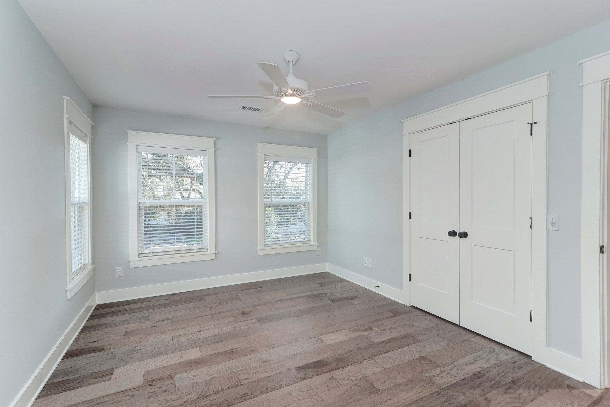 Guest bedroom in a custom Old Village home in Mount Pleasant SC by Iconic Developments