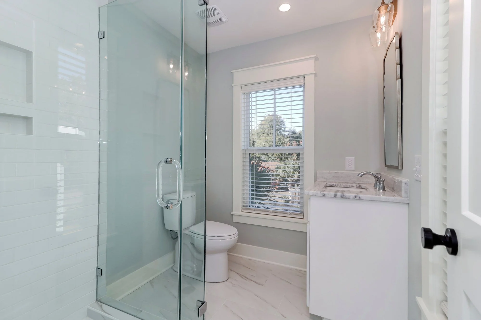 Frameless glass shower and custom tile in a Mount Pleasant SC luxury custom home build