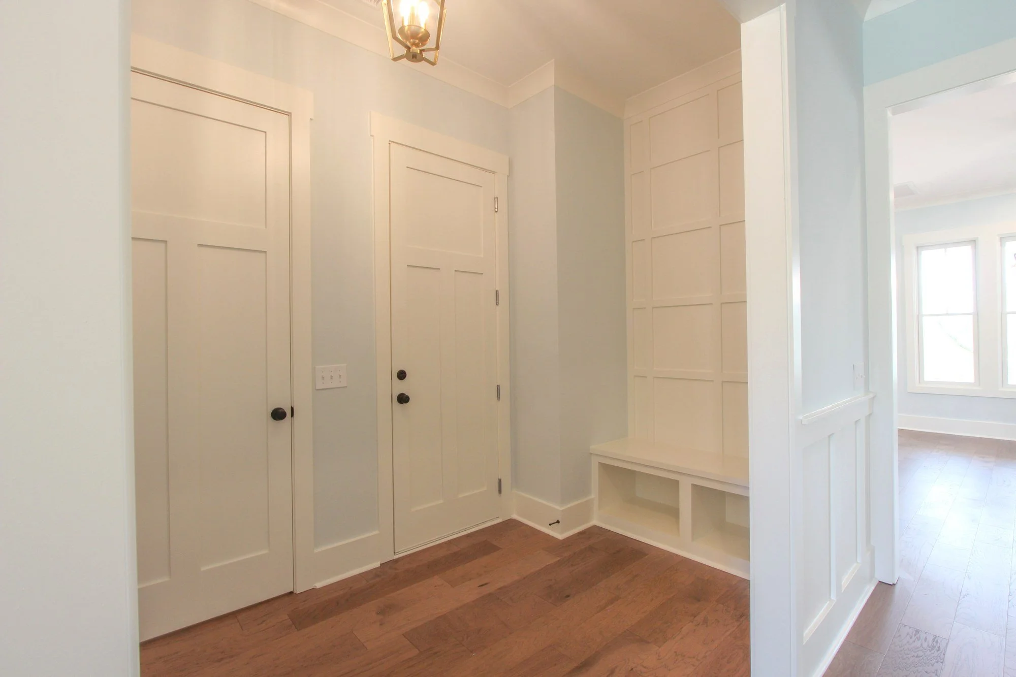 Mudroom with custom built-in bench and cubbies in a Johns Island SC custom home