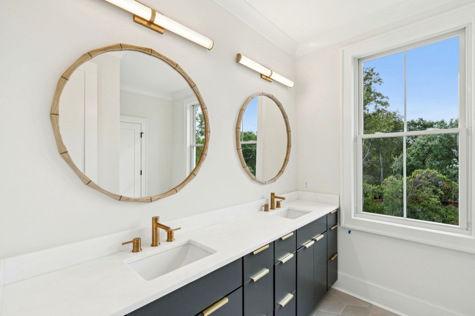 Primary bath double vanity with custom cabinetry in a Charleston SC luxury home build