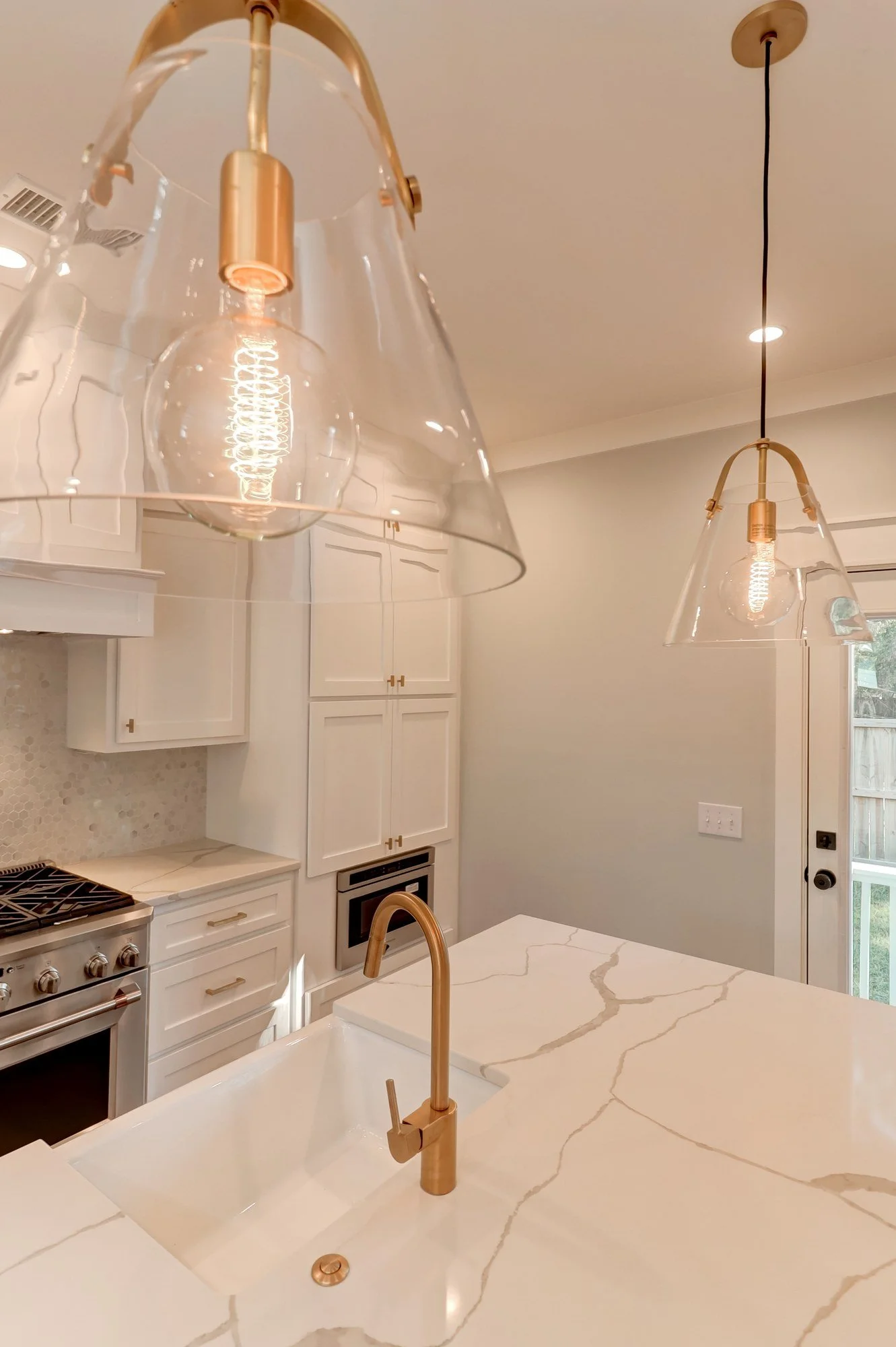 Glass pendant lighting detail in a Mount Pleasant SC custom home by Iconic Developments