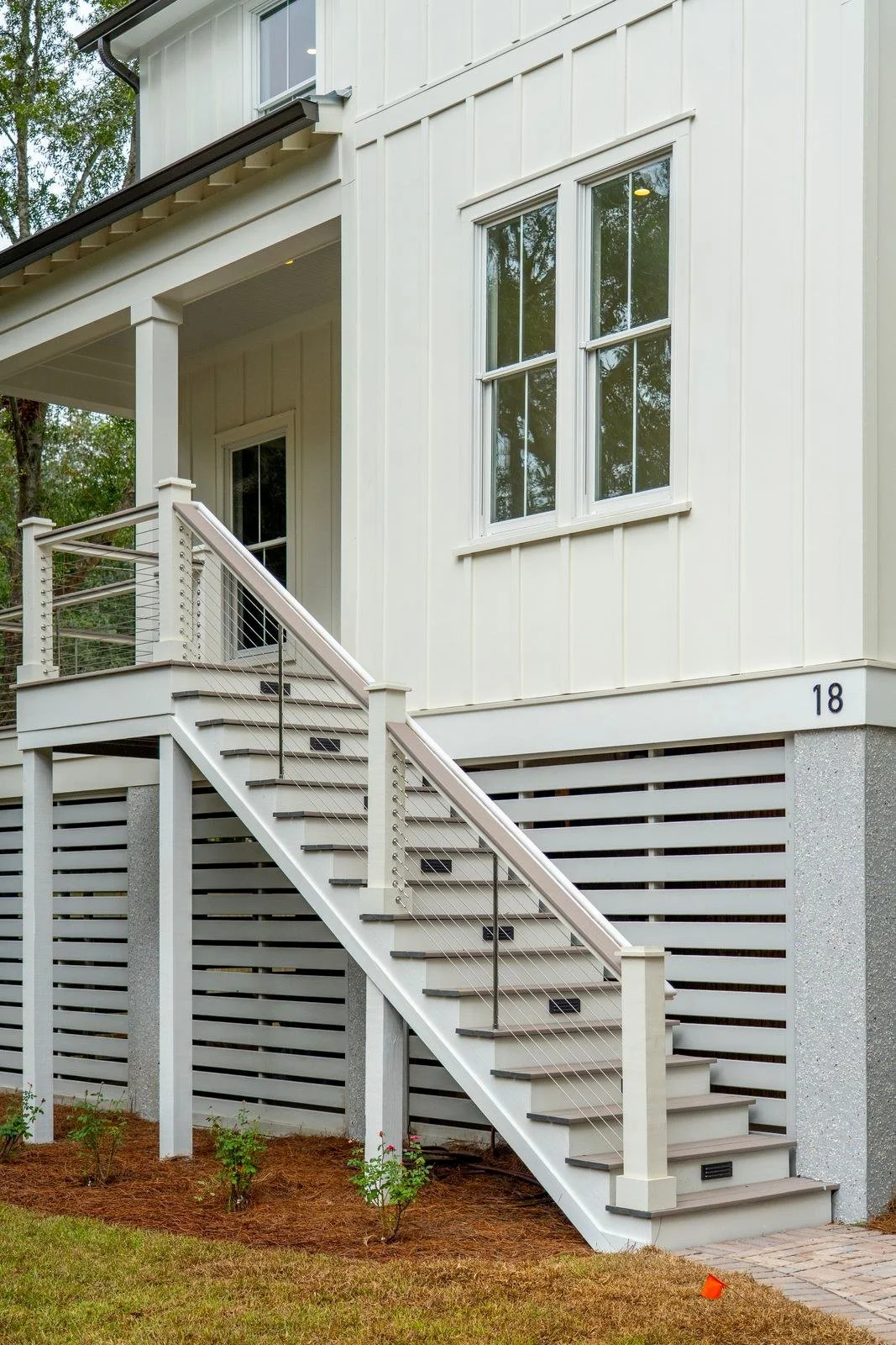 Raised entry staircase to the front porch of an elevated Isle of Palms SC custom home