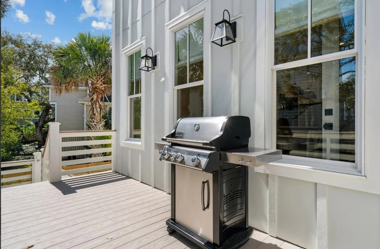 Covered grilling porch on a custom Isle of Palms SC home built by Iconic Developments