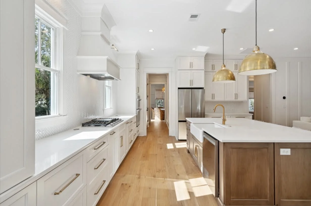 Kitchen prep island with farmhouse sink in an Isle of Palms SC luxury custom home