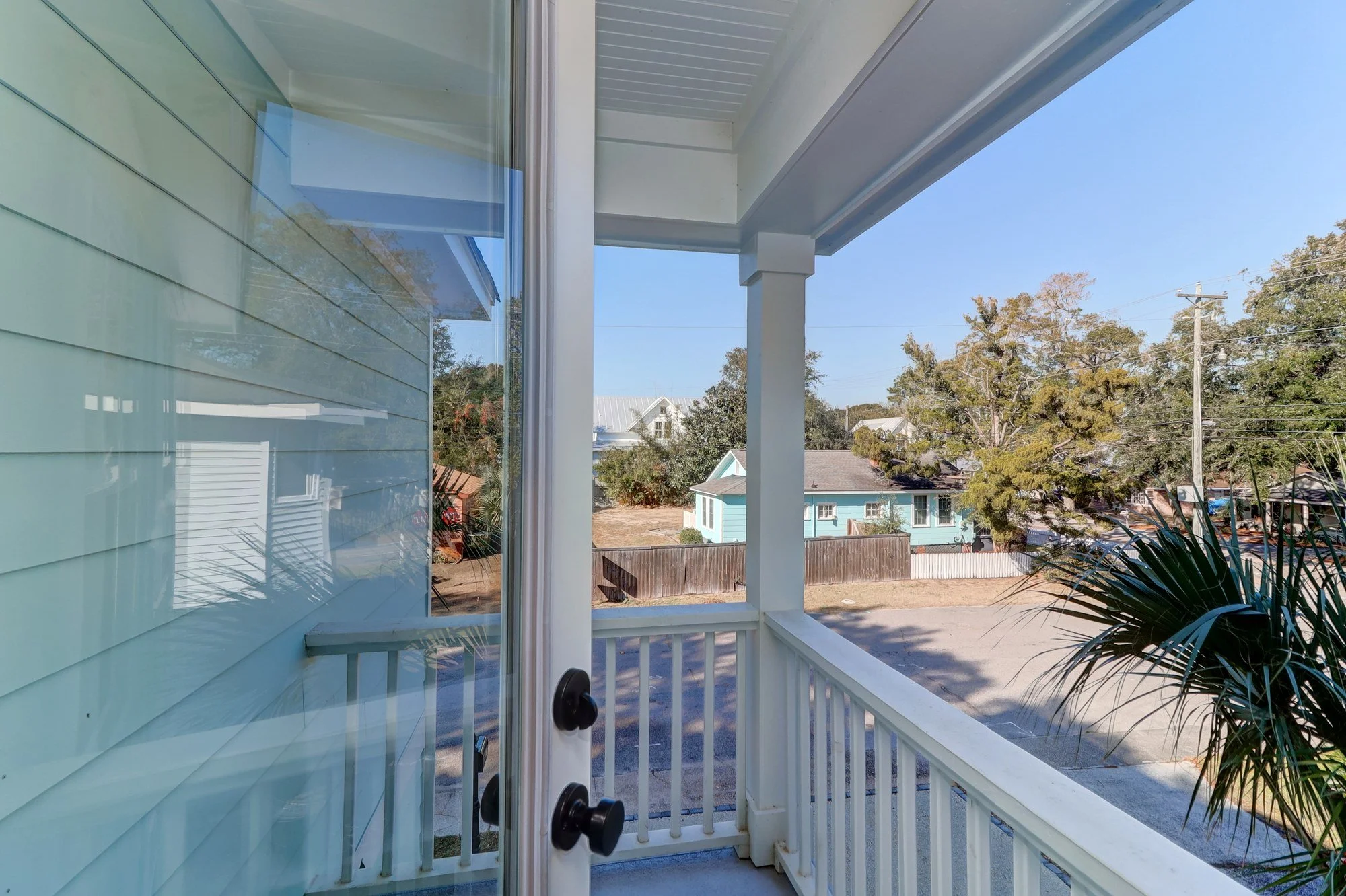 Second-floor porch on a custom Old Village home in Mount Pleasant SC by Iconic Developments