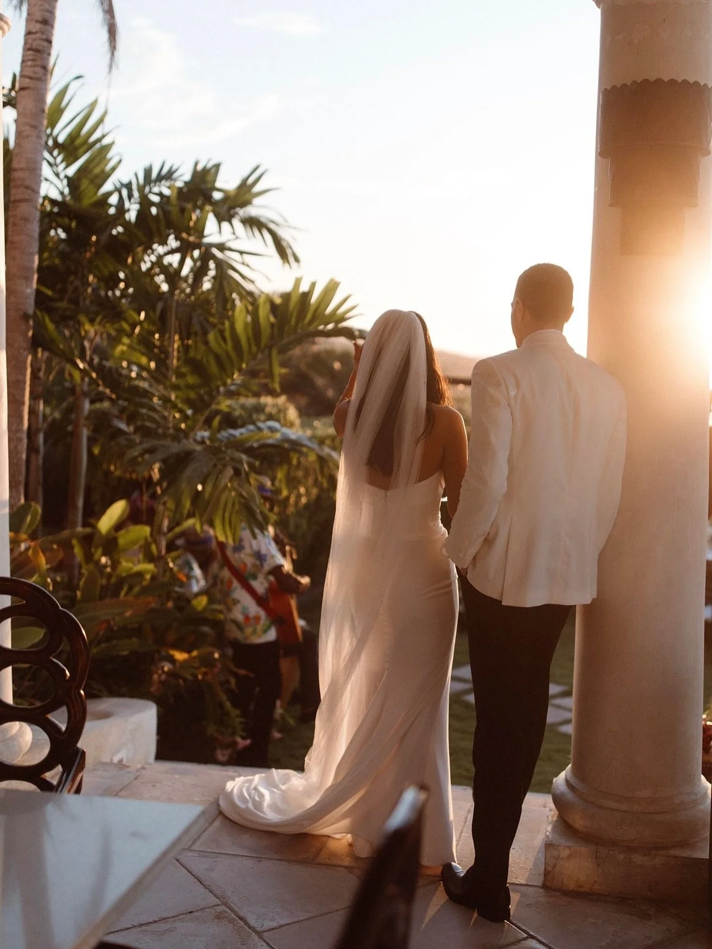 A photo of these sweeties getting a kiss from the Sun on their wedding day. #jamaicawedding #tryallclubwedding #tryallclubjamaica #thetryallclubweddings