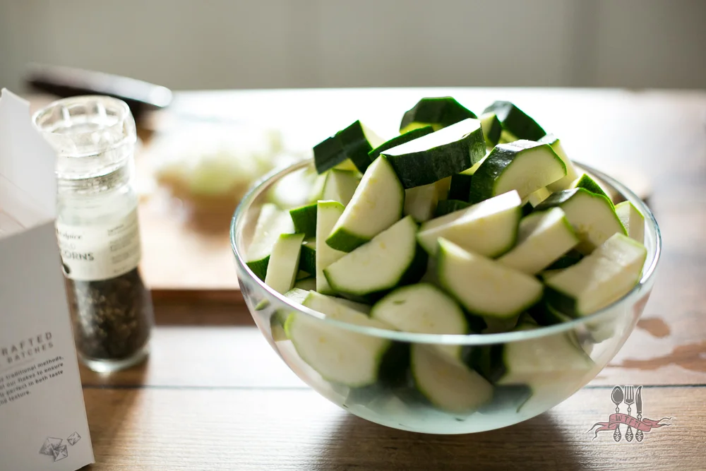 I don't bother peeling the courgettes, just give them a wash and they're good to go. If you want a lighter, almost white coloured soup, then peel away, my friend. Peel away. 