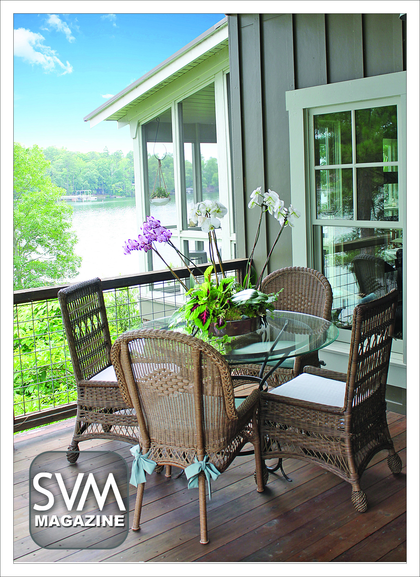 With abundant views of Lake Harding, the Peek's refurbished side porch is the perfect place for a family breakfast. The Peeks dress the table with orchids and surround it with four wicker chairs for seating. With a hogwire railing, one's view of the lake is unobstructed.